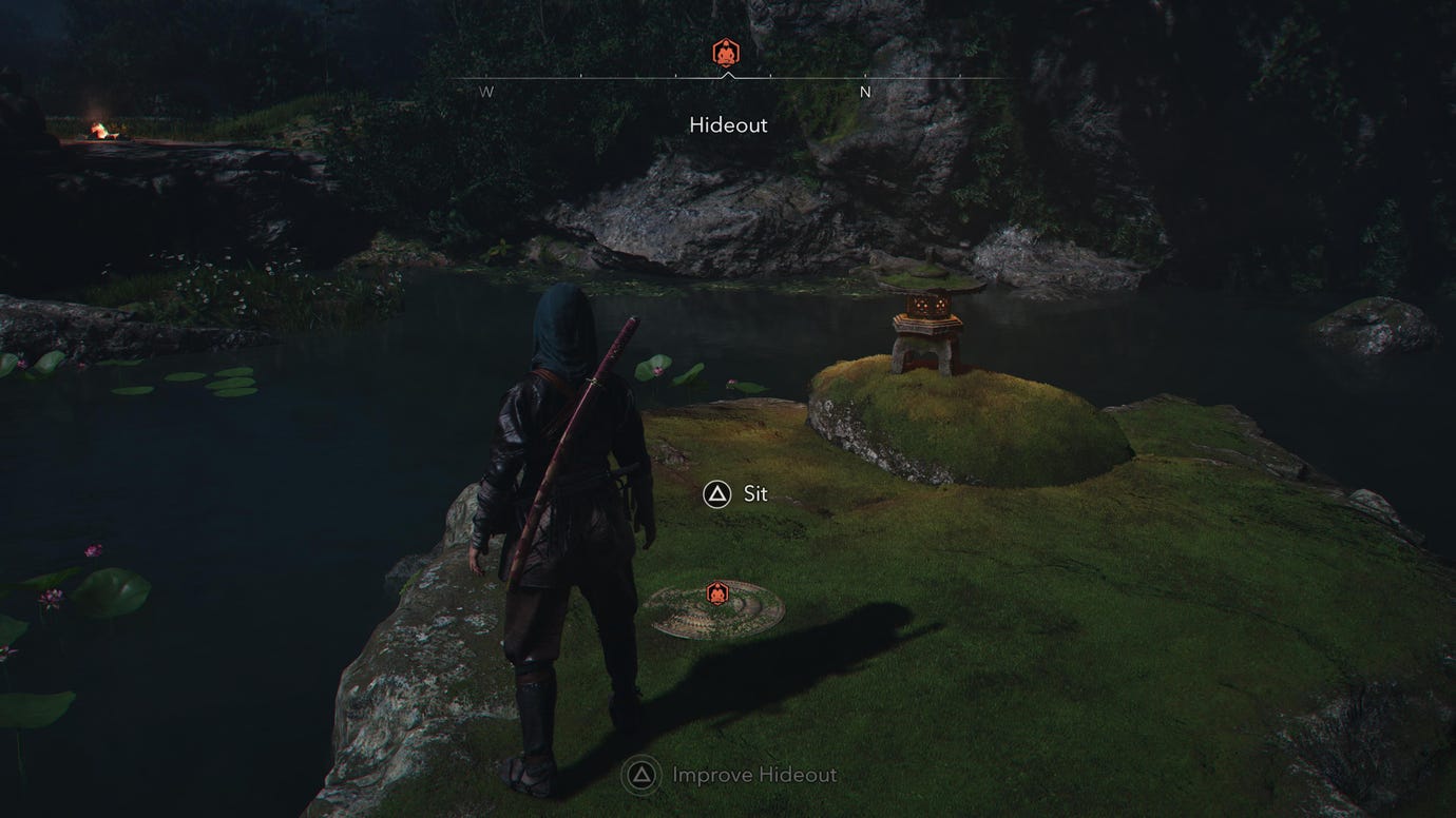 Место для Кудзи-кири в Укрытии в Assassin's Creed Shadows, расположенное на скалистом островке посреди пруда.