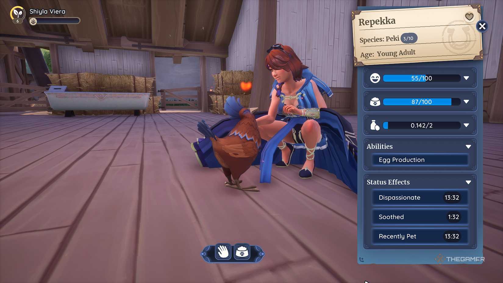 Palia Petting a Peki in a barn.