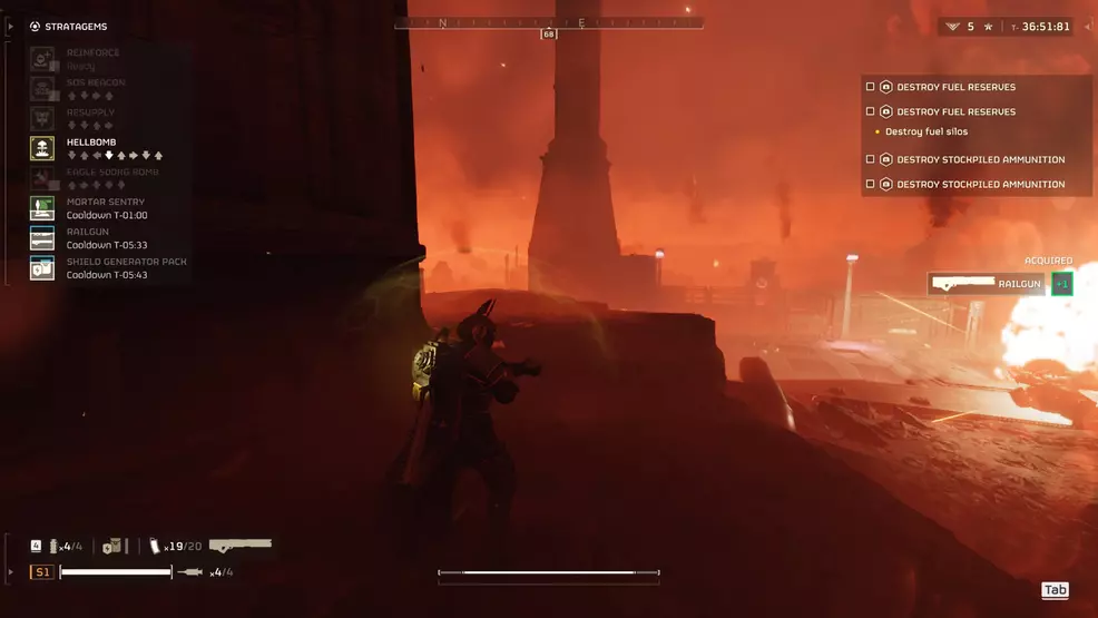 The player calls down a hellbomb near a fuel reserve in Helldivers 2