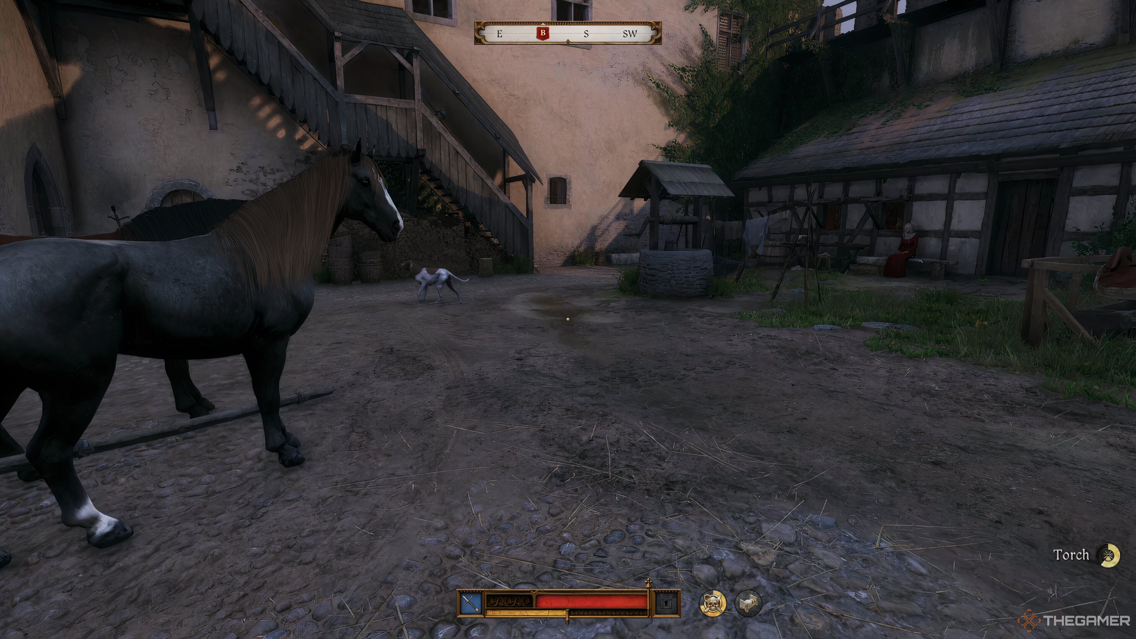 Equipping a torch in Kingdom Come: Deliverance 2.