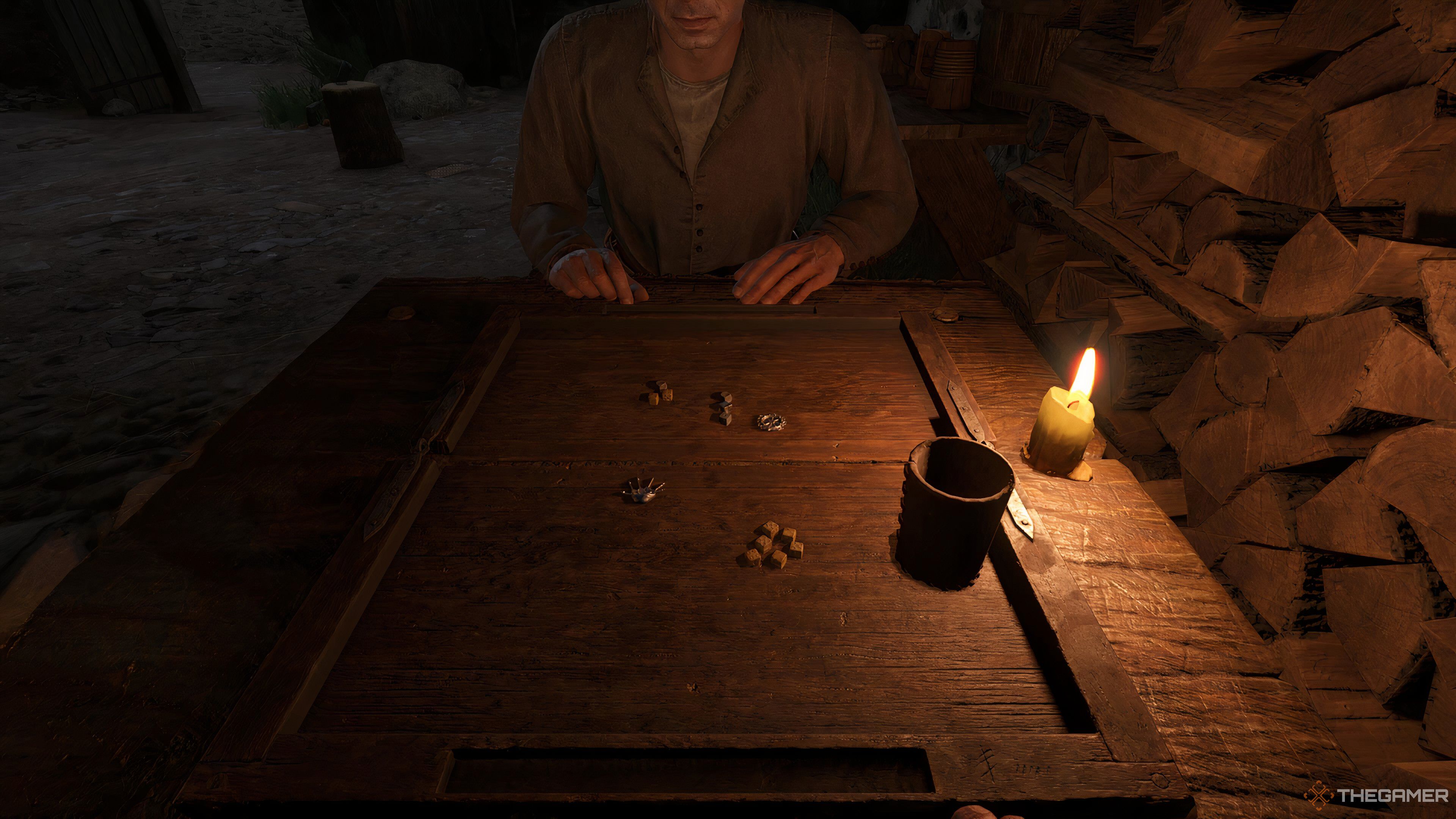 Two players playing dice in Kingdom Come: Deliverance 2, with a table.