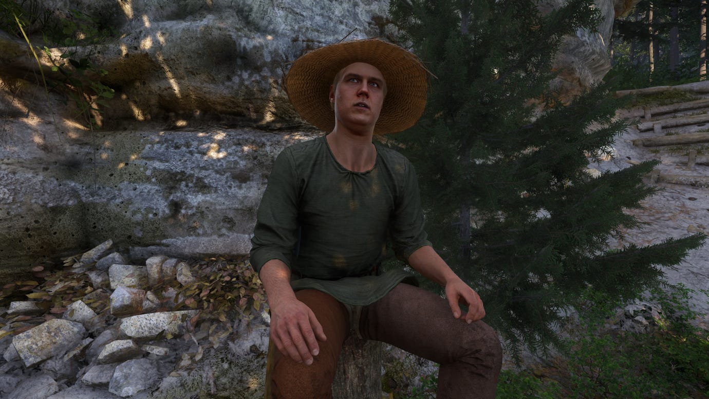 Pepa, a villager in Kingdom Come: Deliverance 2, sits outside his cave where he turns cabbage into Sauerkraut.