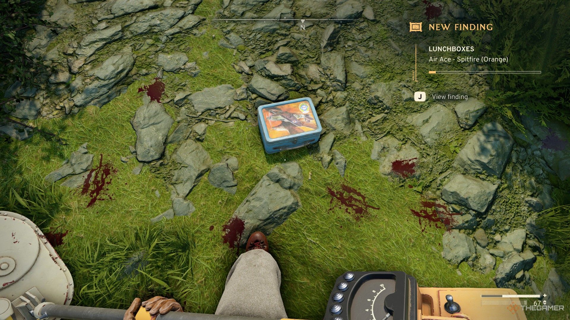 the player digs up the orange air ace lunchbox in atomfall.
