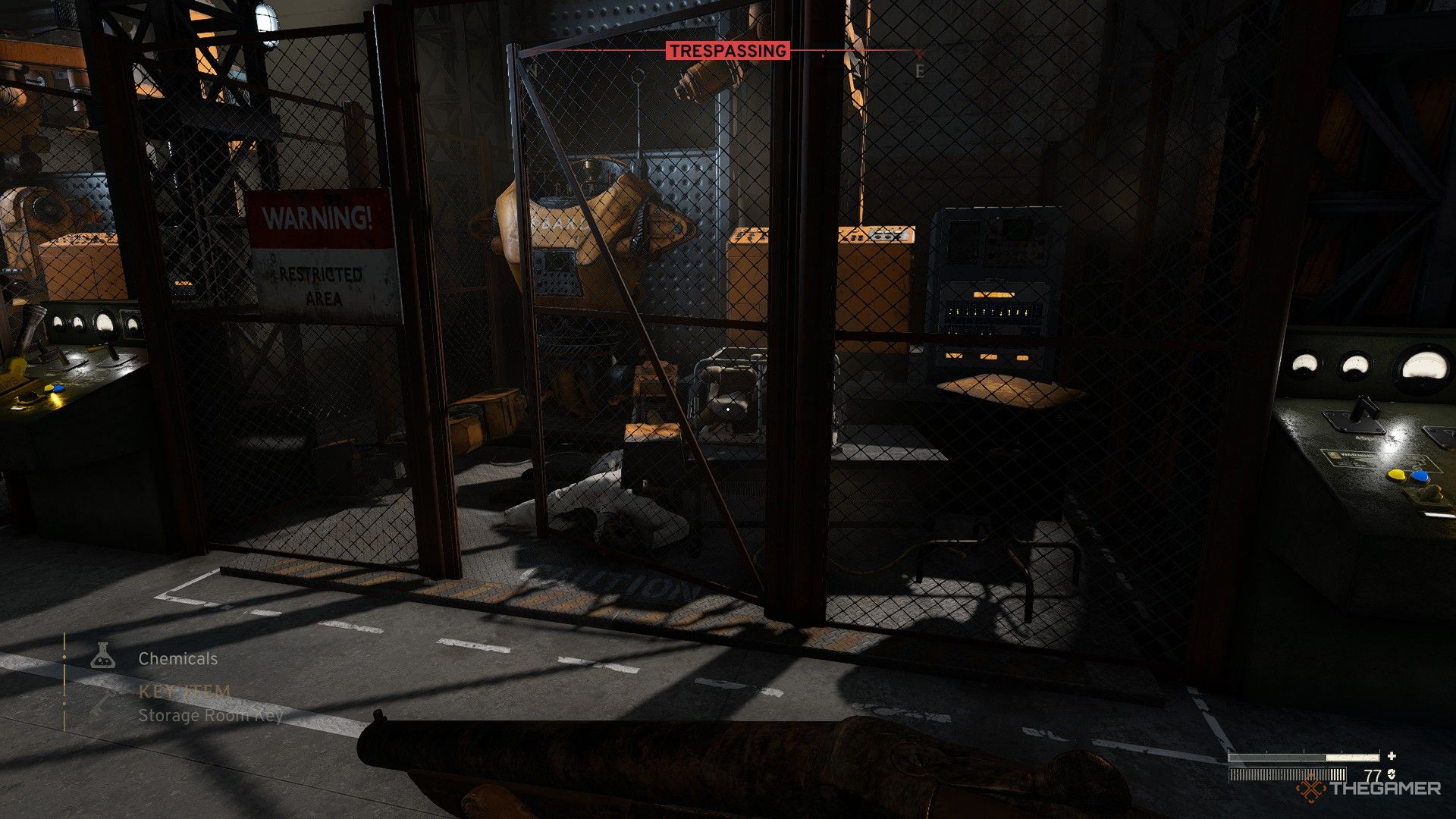 a dead scientist falls to the ground after being released from a robotic crane arm in atomfall.