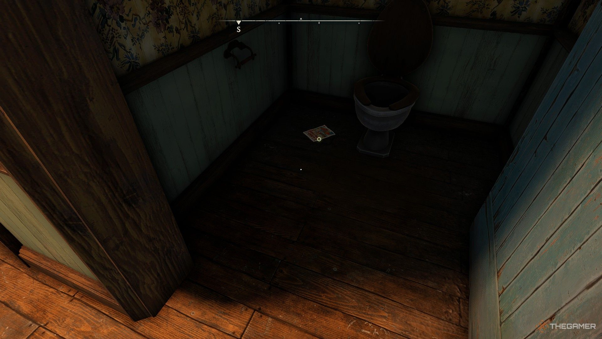 a comic book on the floor of a bathroom stall in the grendel's head pub in atomfall.