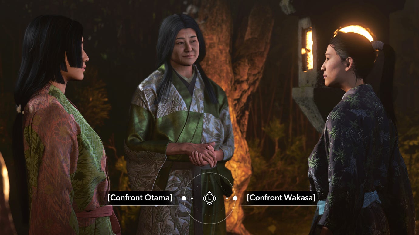 Three women stands in a group in a garden at night in Assassin's Creed Shadows. A dialogue option at the bottom of the screen prompts the player to choose between "Confront Otama" and "Confront Wakasa".