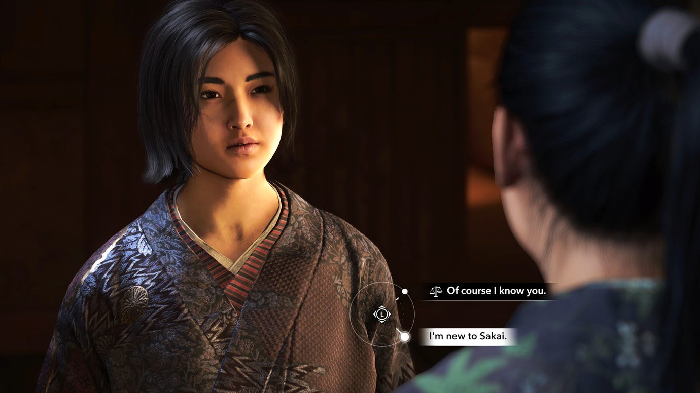 Naoe in Assassin's Creed Shadows speaks with Wakasa in a garden at night.