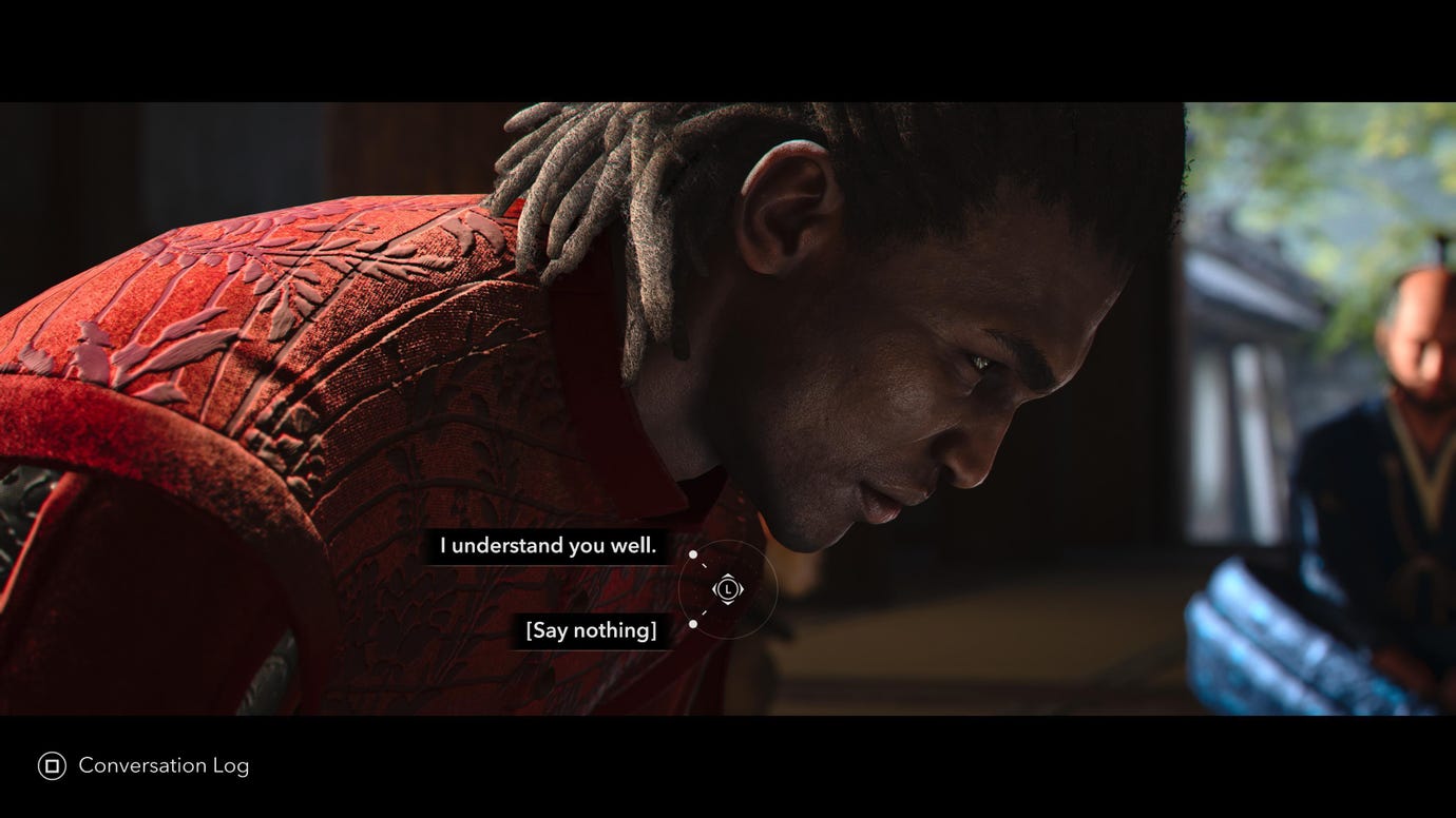 Yasuke with his head bowed, and two dialogue choices displayed at the bottom of the screen in Assassin's Creed Shadows.