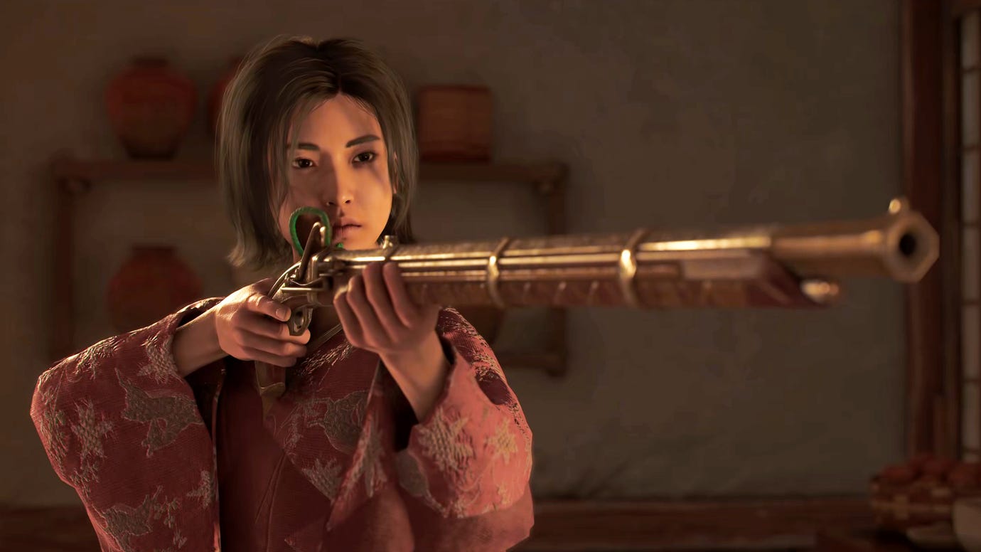 Naoe in Assassin's Creed Shadows aims a golden teppo at someone off-screen indoors.