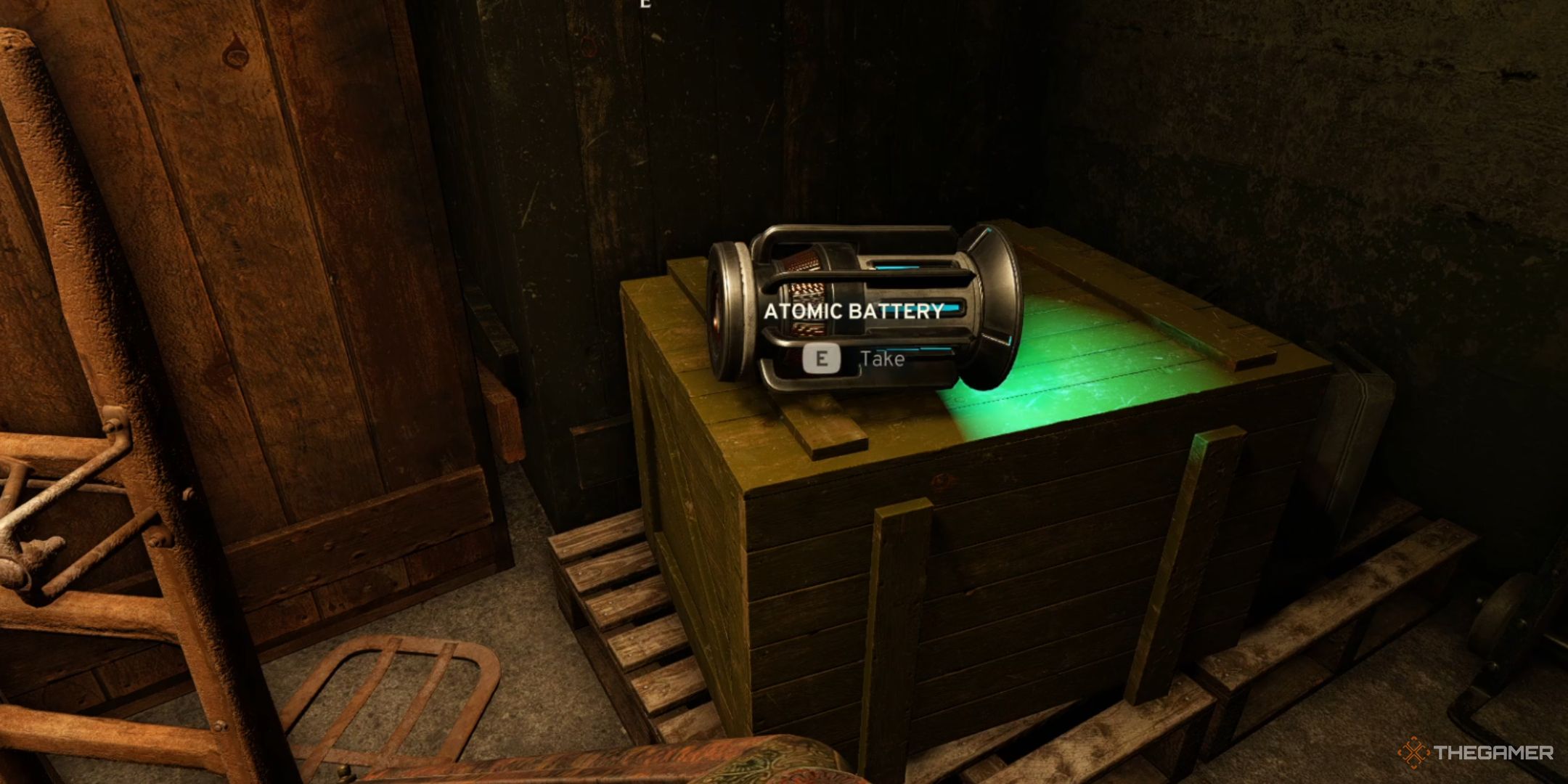 an atomic battery lies on a wooden crate in atomfall.