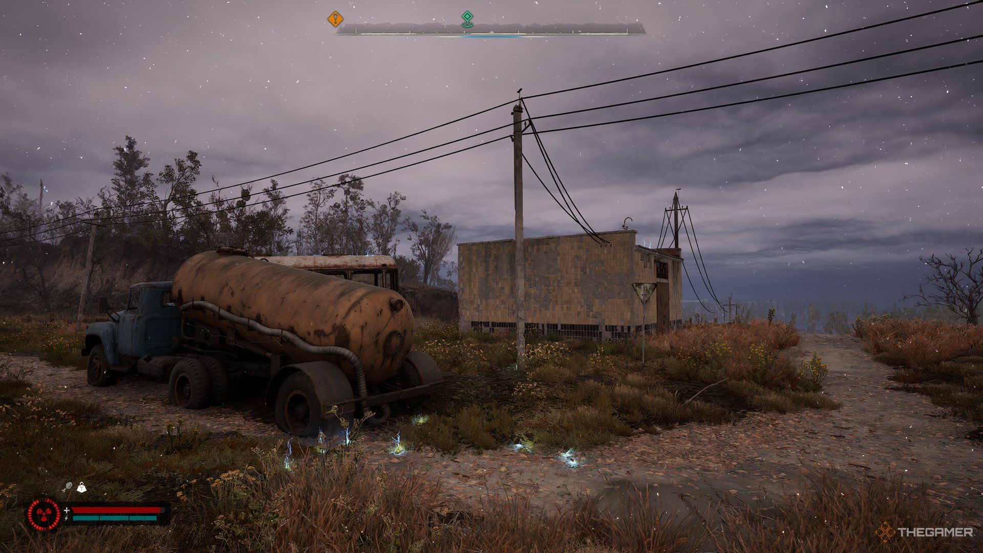 An image showing a building next to two trucks. There are electrical discharge from the ground. 