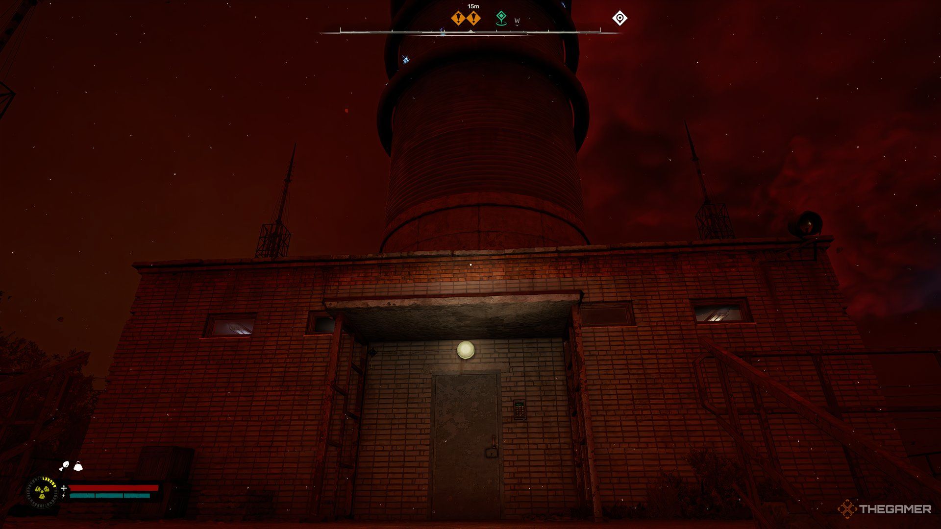 An image showing a building with big chimney and red clouds.