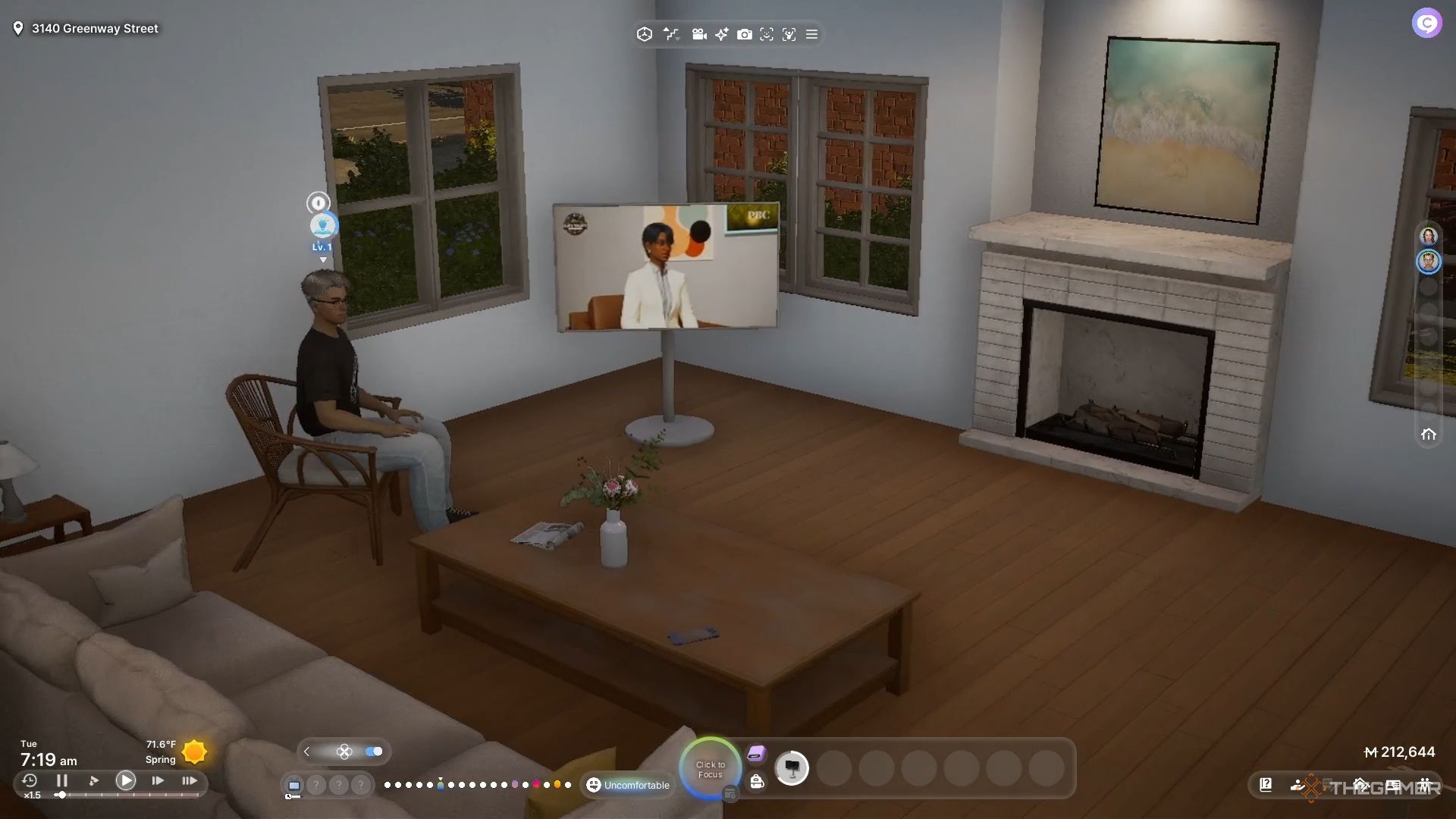 A male zoi sitting in his living room watching TV.
