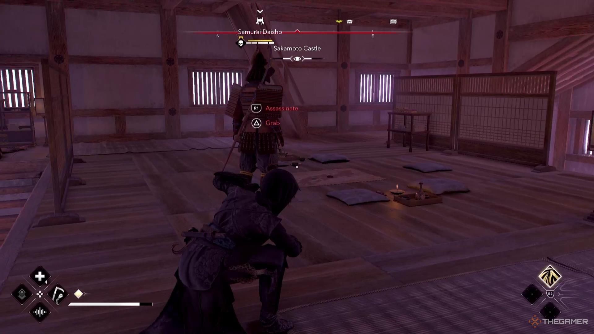 Naoe stands behind a samurai in Assassin's Creed Shadows.