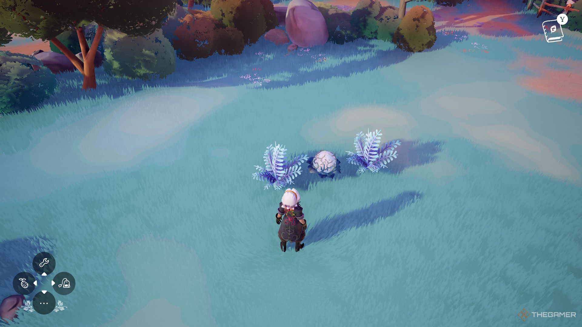 A plant egg with a Blue Fern on either side of it to create a Small Hybrid in Wanderstop.