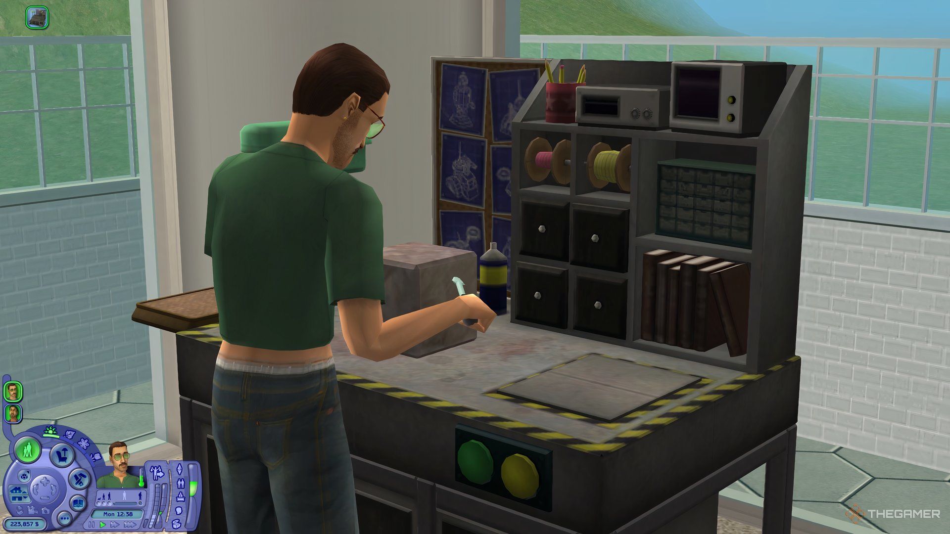 A Sim from behind using the robot bench to tinker in The Sims 2.