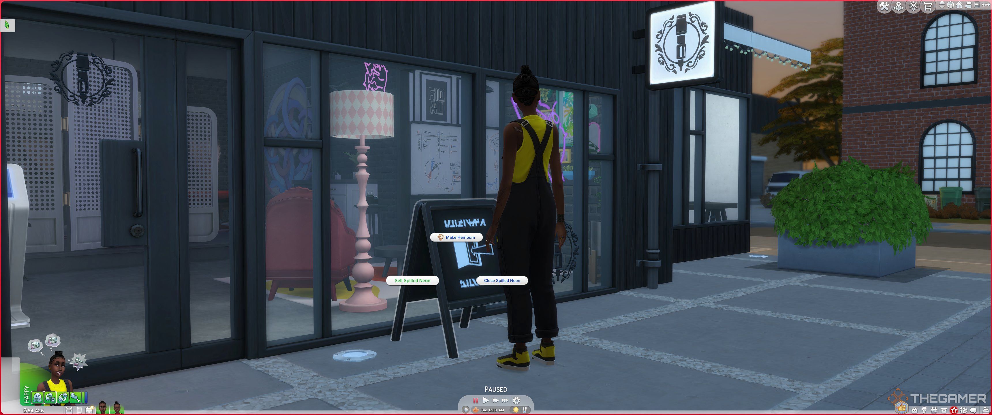 The sign outside Spilled Neon with sale options on sign.