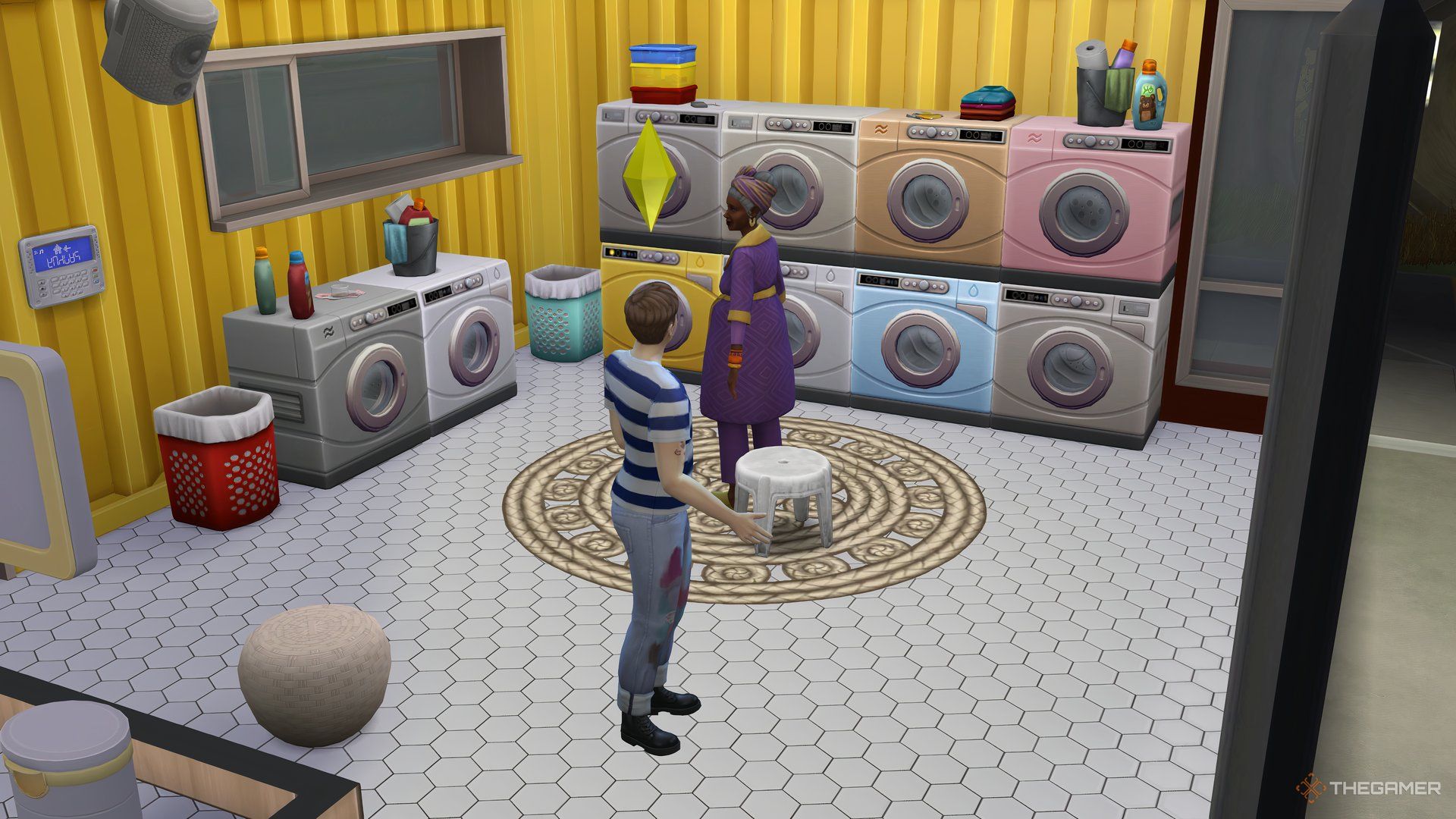 Two Sims Talking In A Laundromat In The Sims 4 with laundry stuff around them