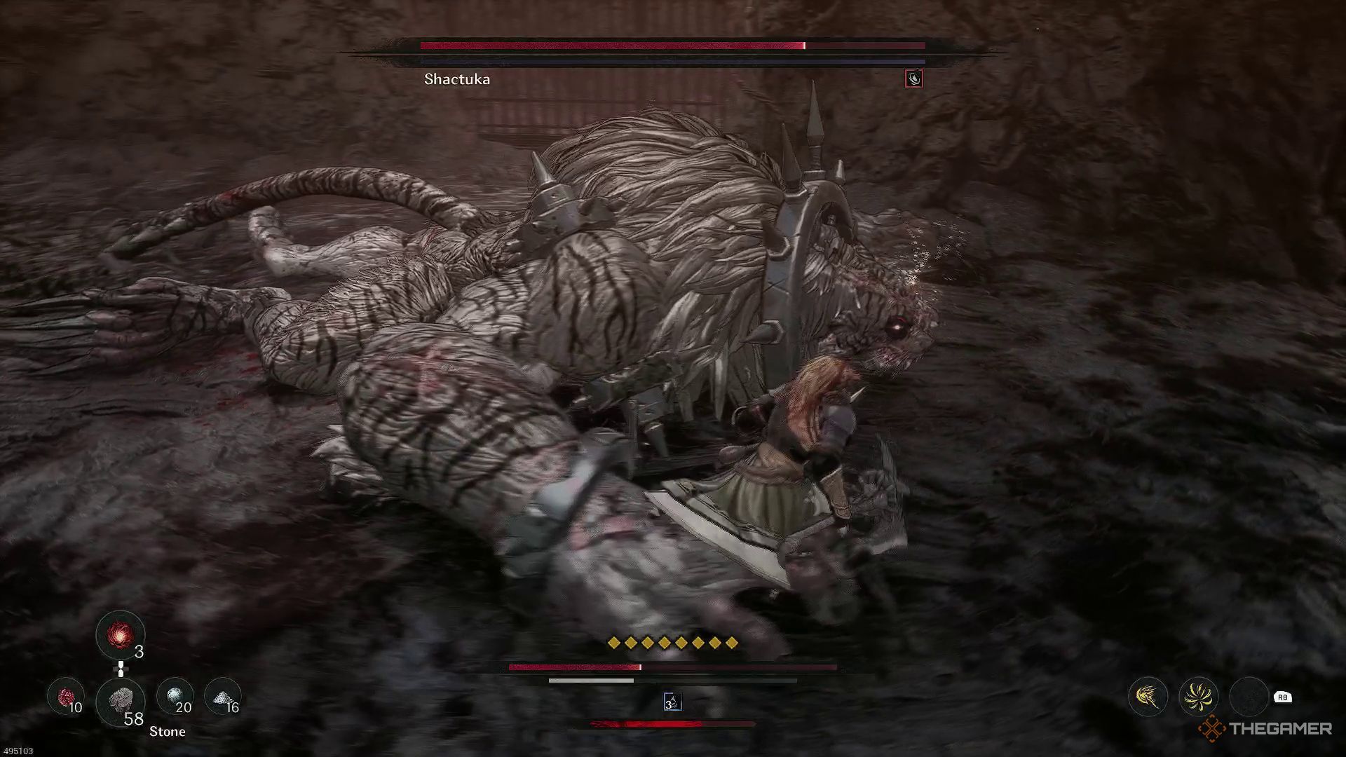 The image shows Shactuka staggered on the ground in The First Berserker: Khazan.