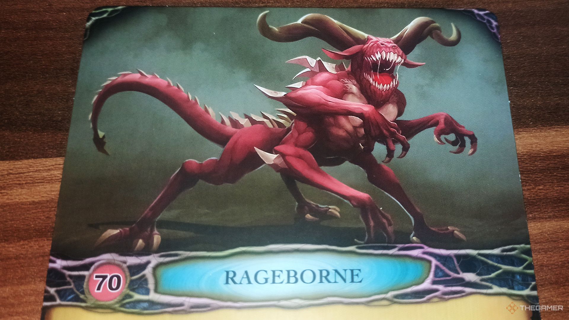 A close up view of Rageborne's nemesis mat in Aeon's End.