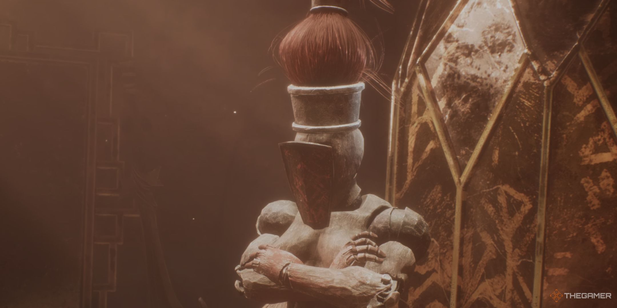 a three-quarter view of golgra in her hut, with her arms crossed, in clair obscur: expedition 33.