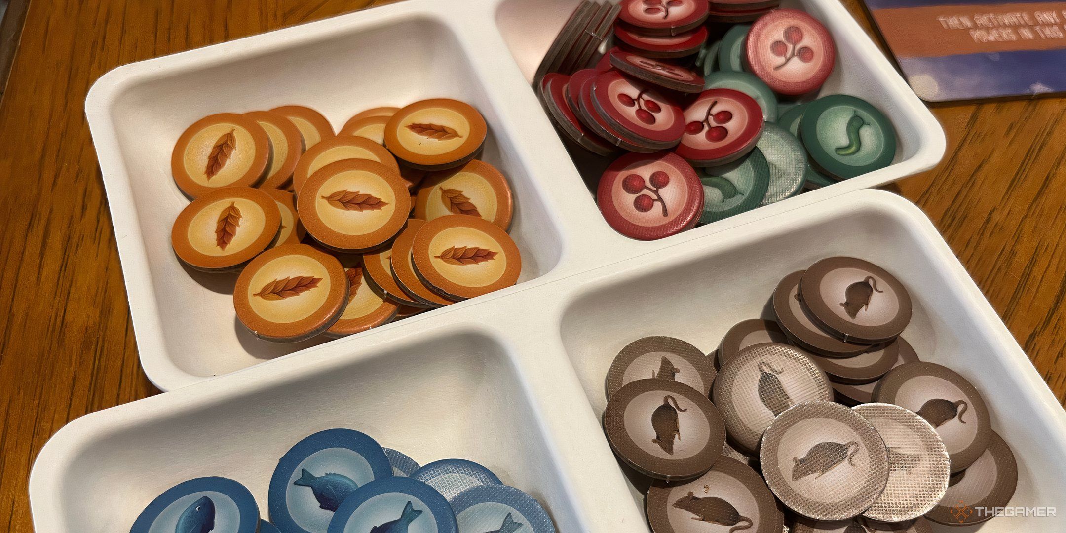 The food tokens in Wingspan in trays.