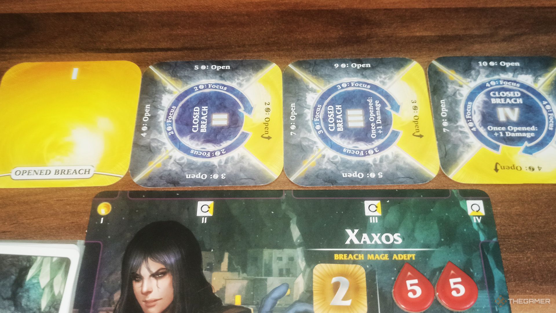 Four breaches placed above the player mat in Aeon's End.