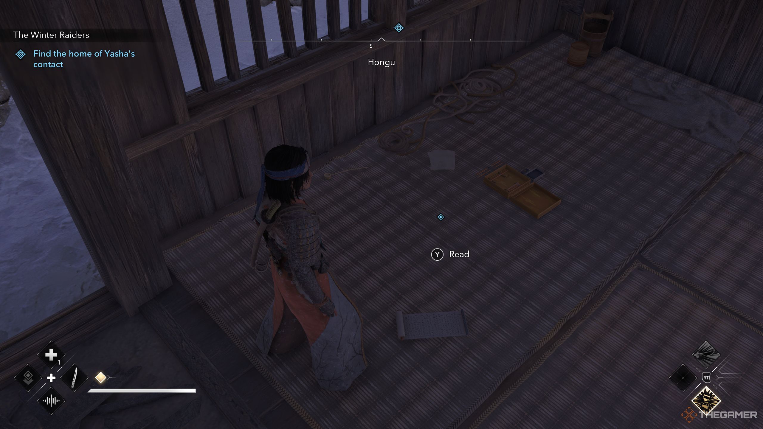 Naoe standing in front of a Letter in AC Shadows.
