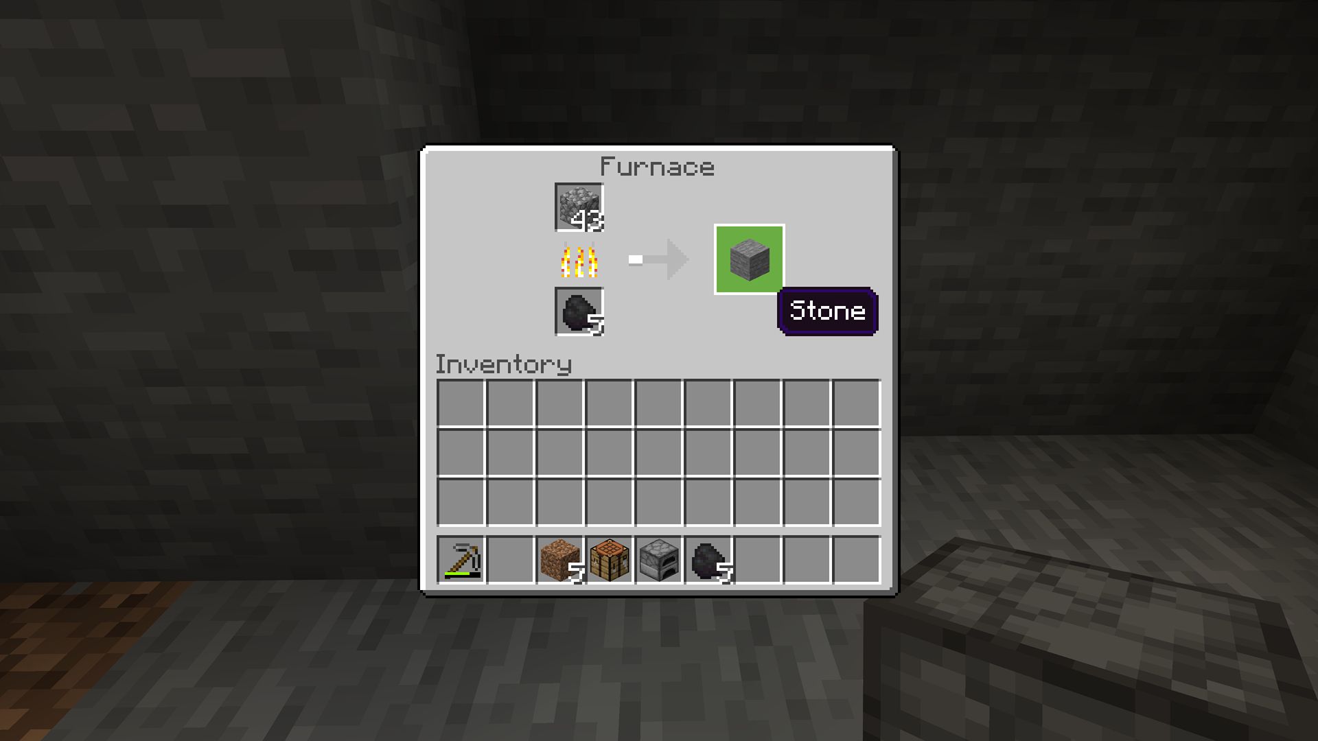 Minecraft screenshot of cobblestone smelting in an furnace, creating stone