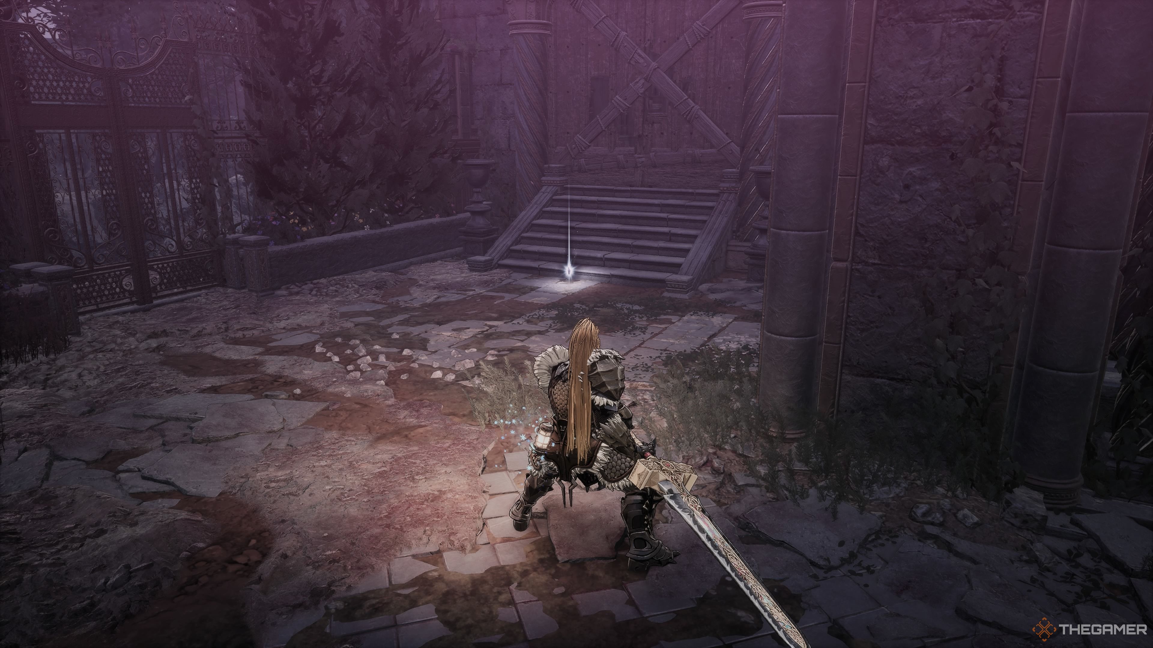 Right of the Bloodied Sanctuary courtyard entrance in The First Berserker Khazan.
