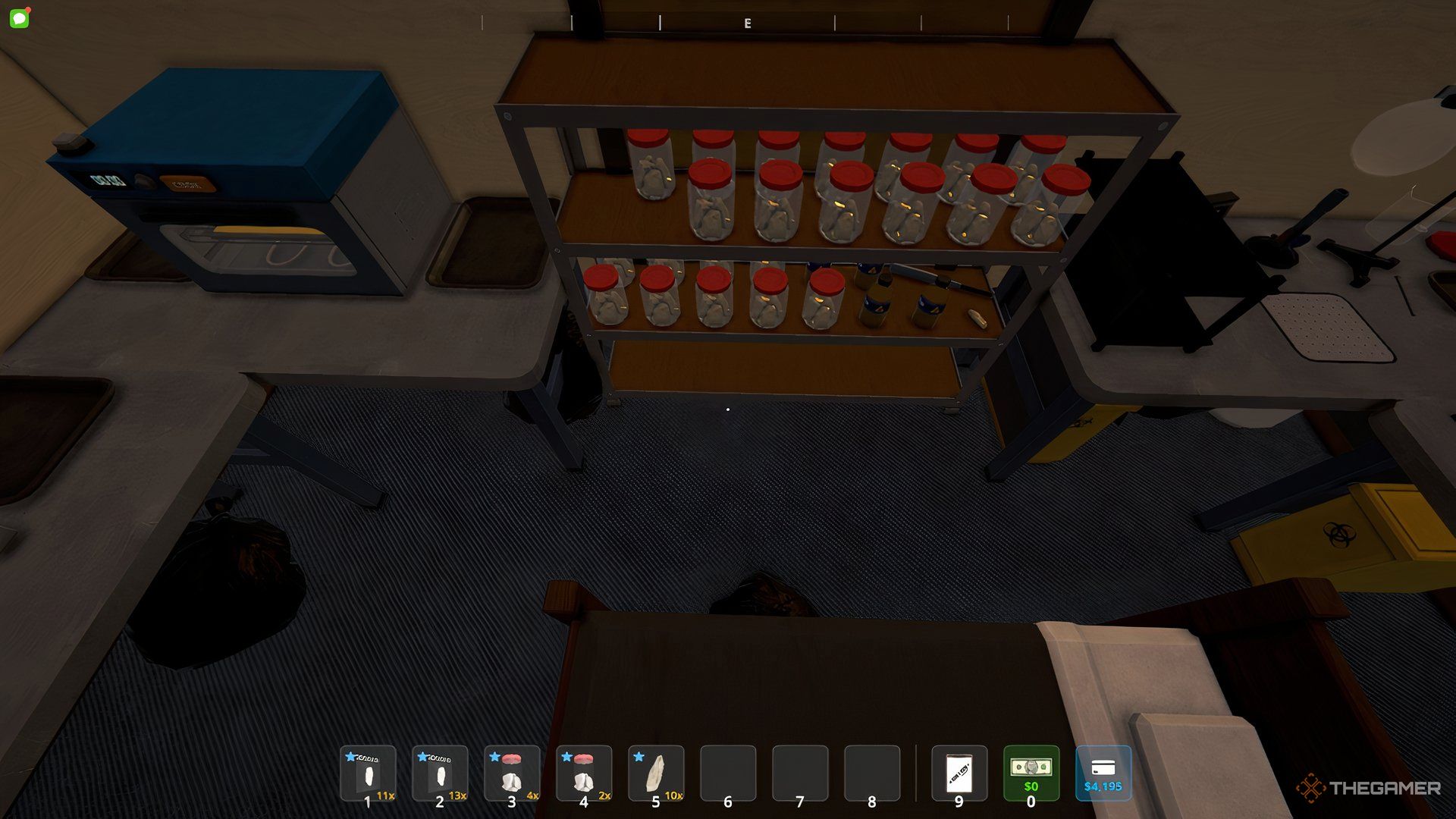 A rack with the two shelves filled with jars. On the left is oven and right in front of the rack is bed. 