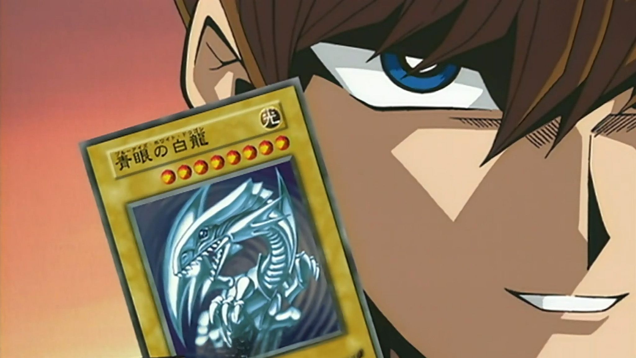Kaiba holds Blue Eyes White Dragon card in Yu-Gi-Oh! Duel Monsters.