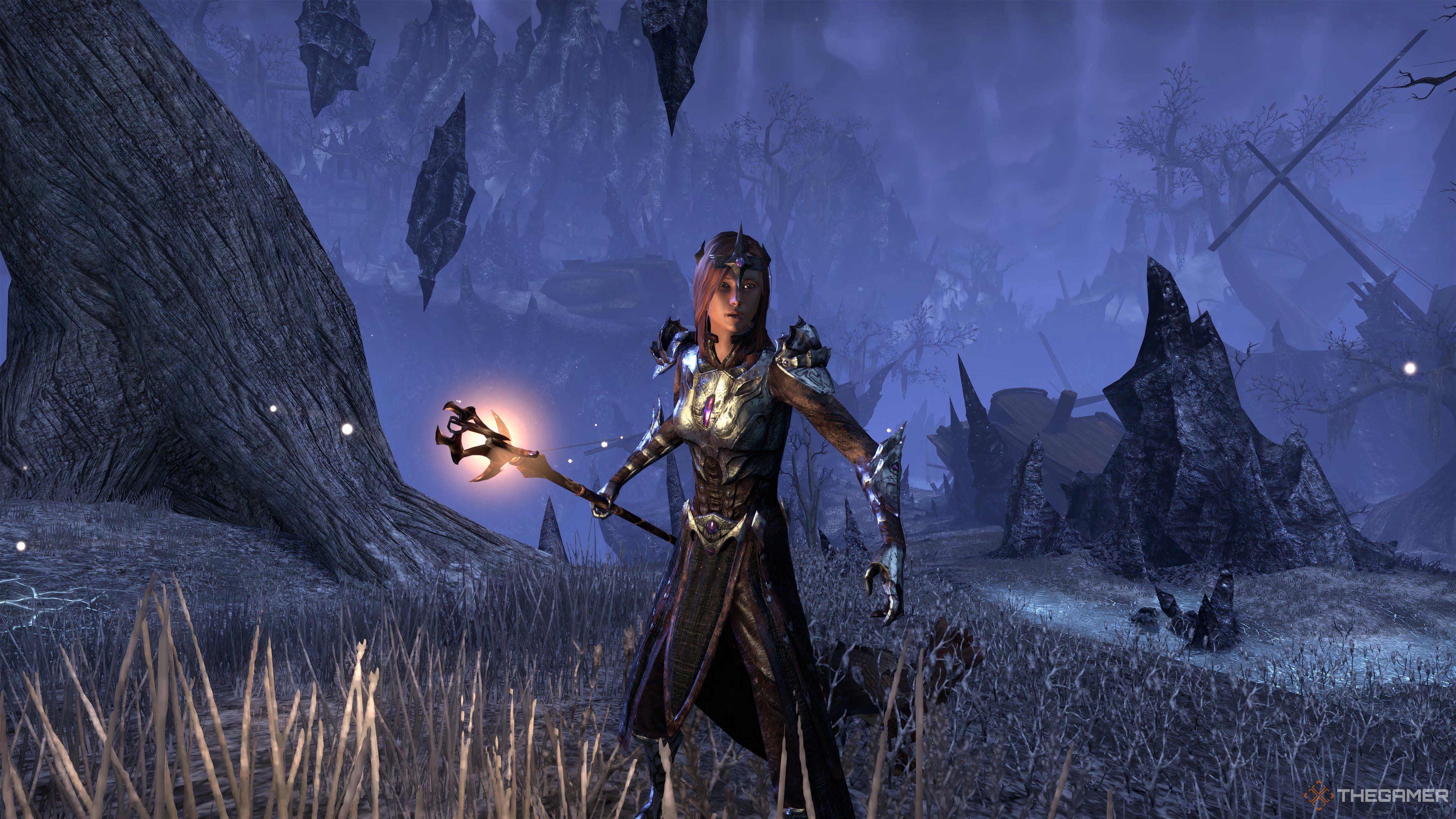Templar weilding a destruction staff in elegant grey in purple armor. Around her is the realm of Coldharbor. 