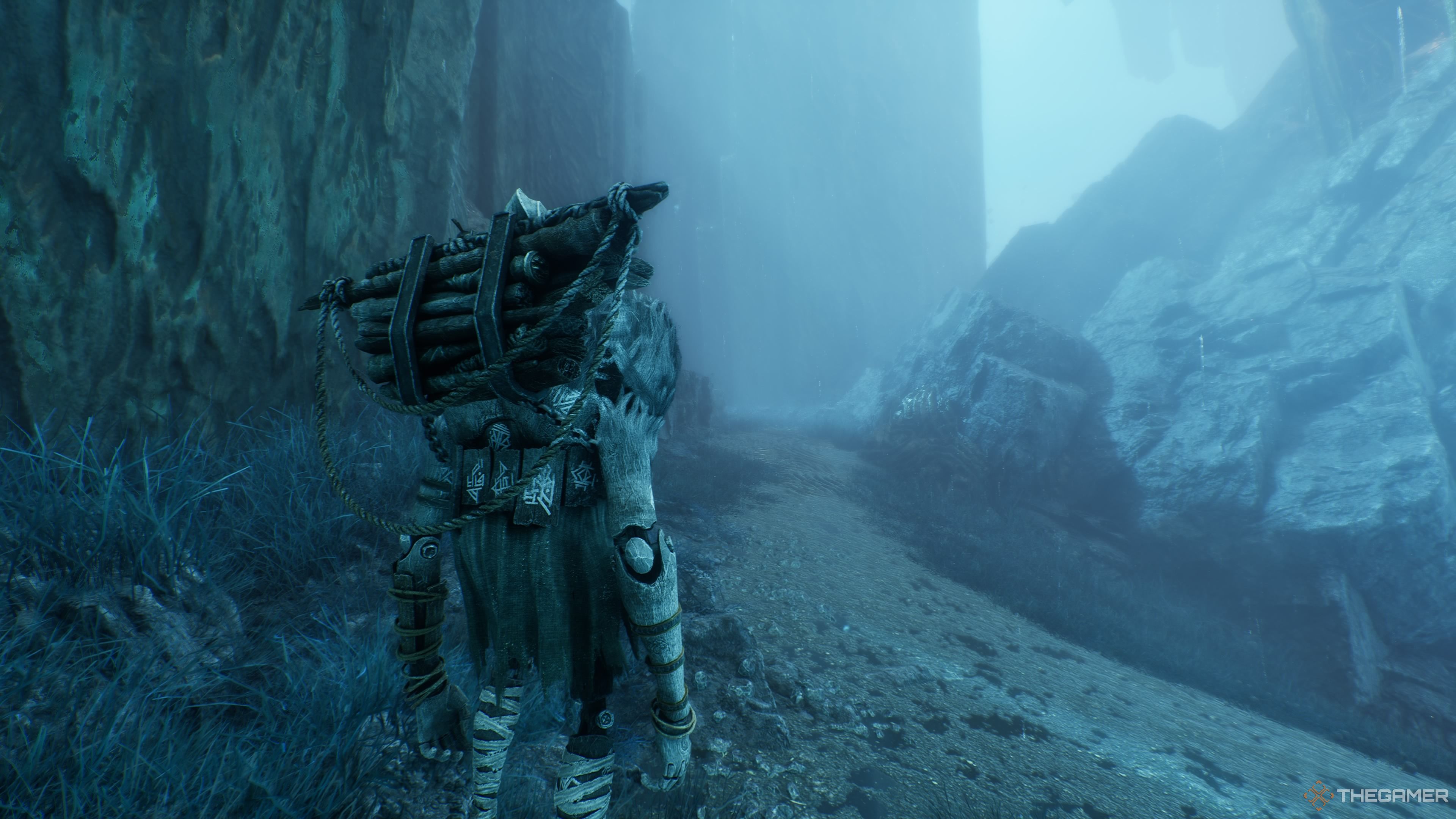 Monoco standing on a path leading up a hill toward where the Chromatic Ramasseur is in Clair Obscur: Expedition 33.