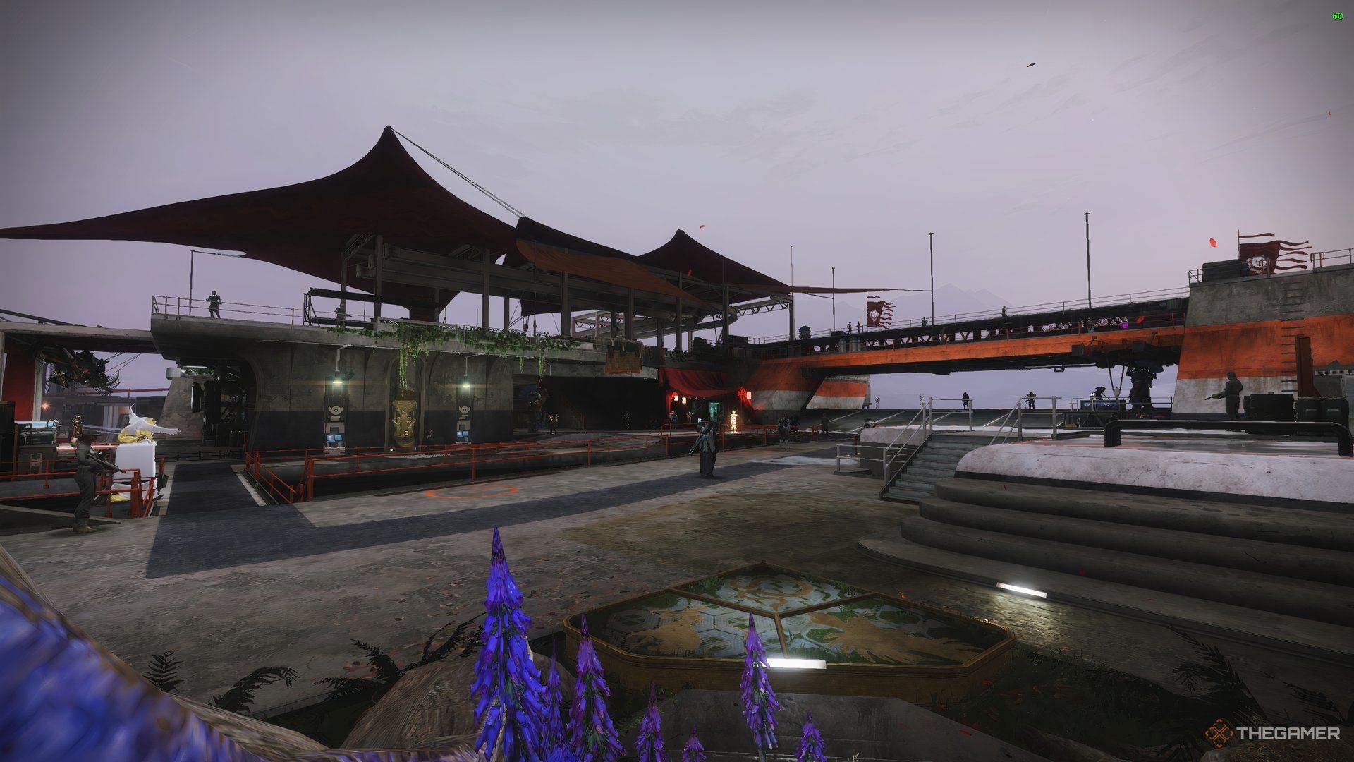 Daytime in The Tower with various vendors like Master Rahool, Lord Shaxx, Postermaster seen in the distance. NPCs are going about their business in Destiny 2.
