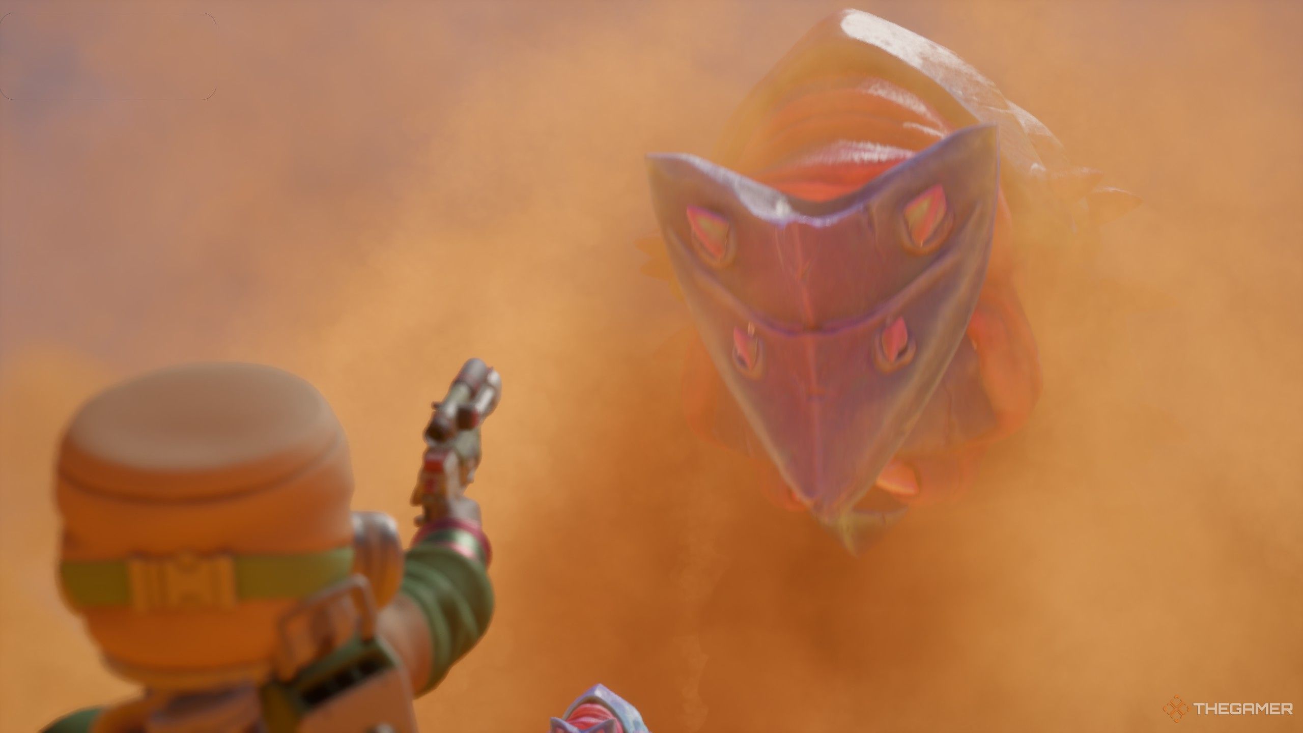 Pointing a gun at wormzilla in revenge of the savage planet.
