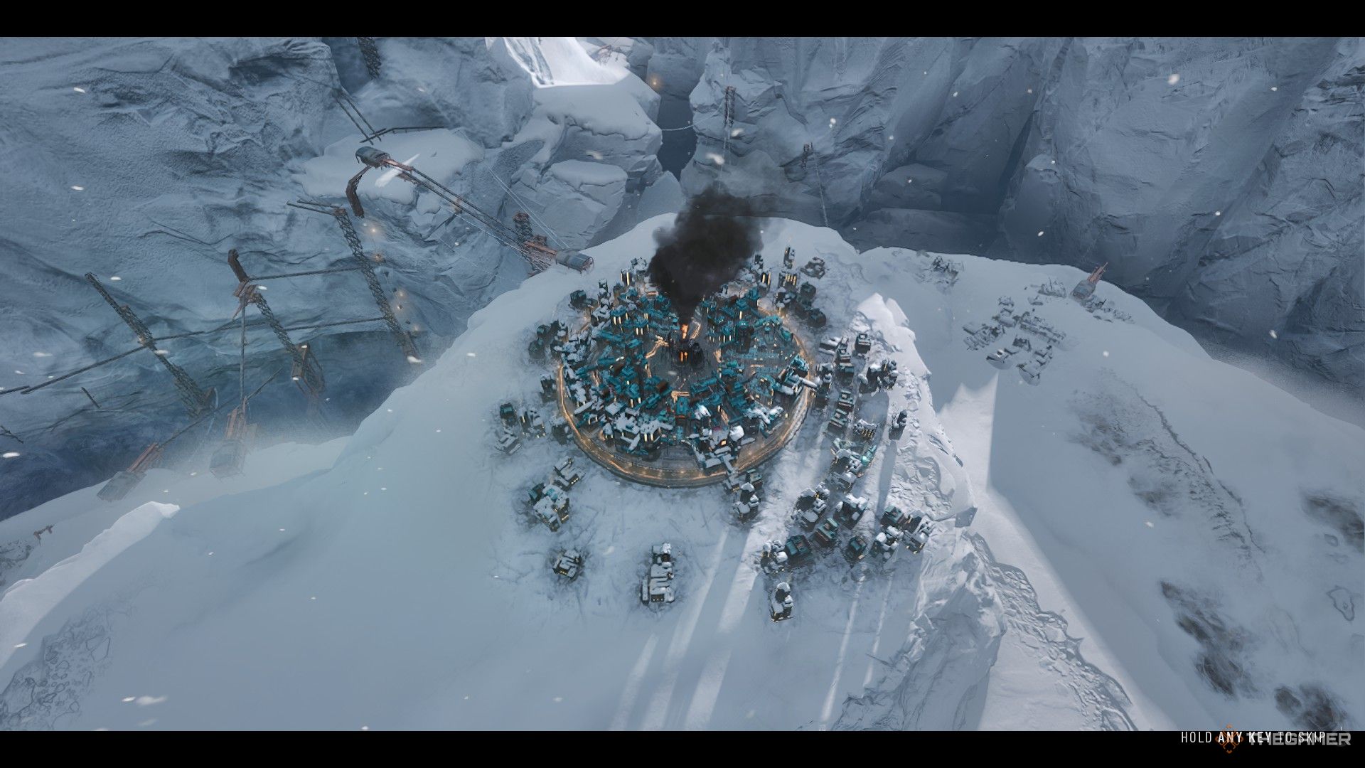 Camera zooms in on a small city starting at the top of the Fractured Gorge in Frostpunk 2.