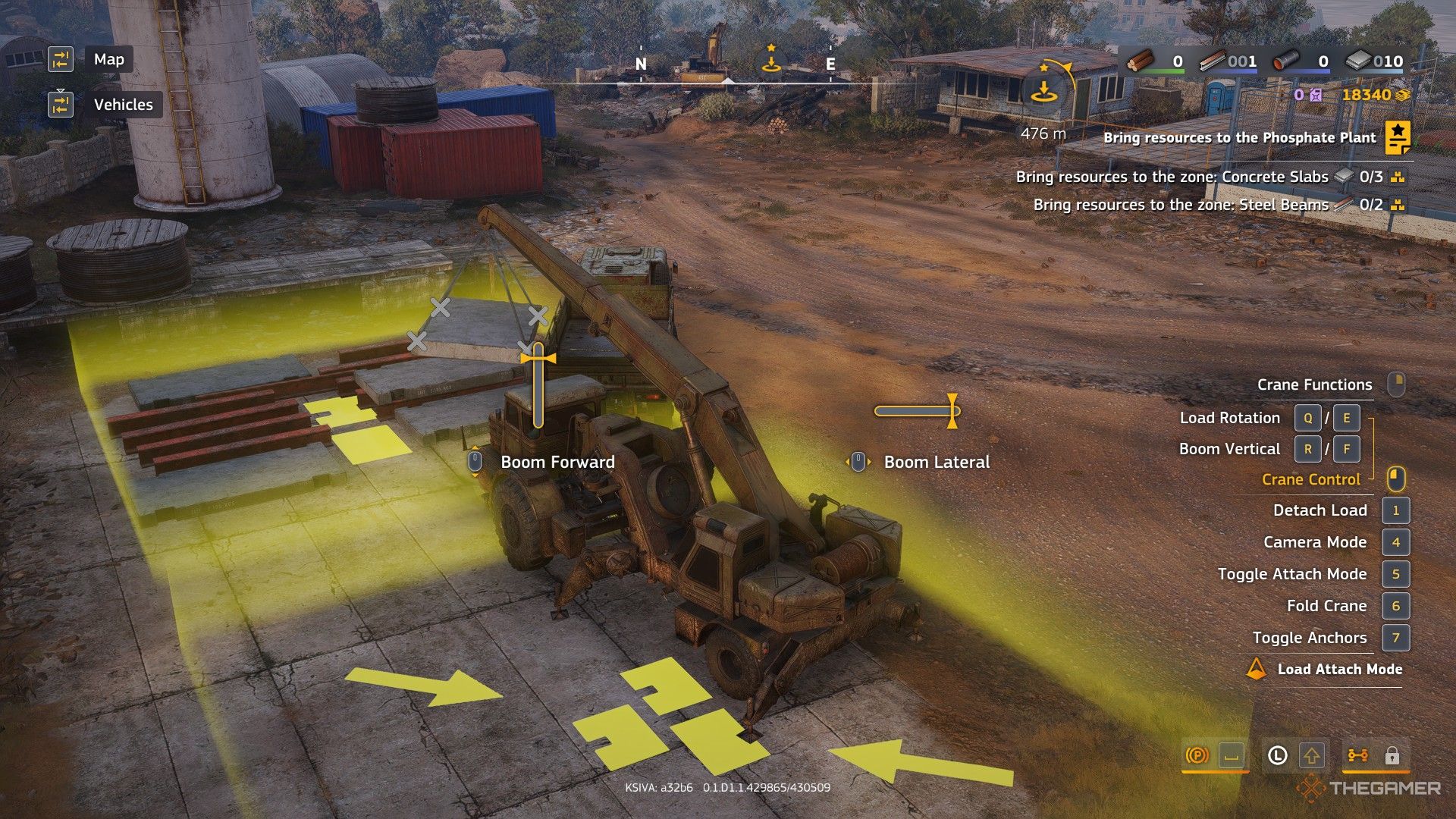 a mobile crane loads a concrete slab onto a cargo truck in roadcraft.