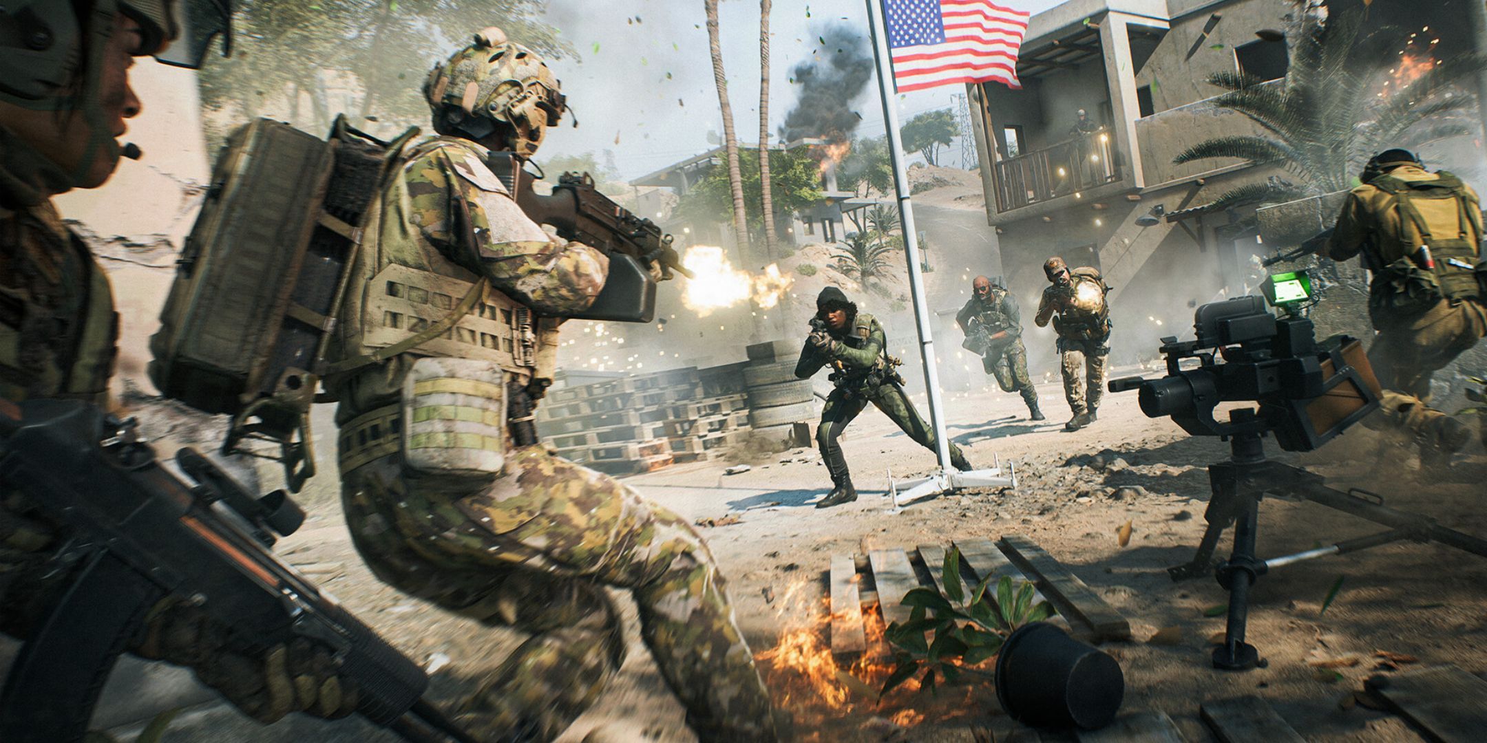 A solderi shooting a squad in front of him, with a soldier next to a USA flag, in Battelfield 2042.