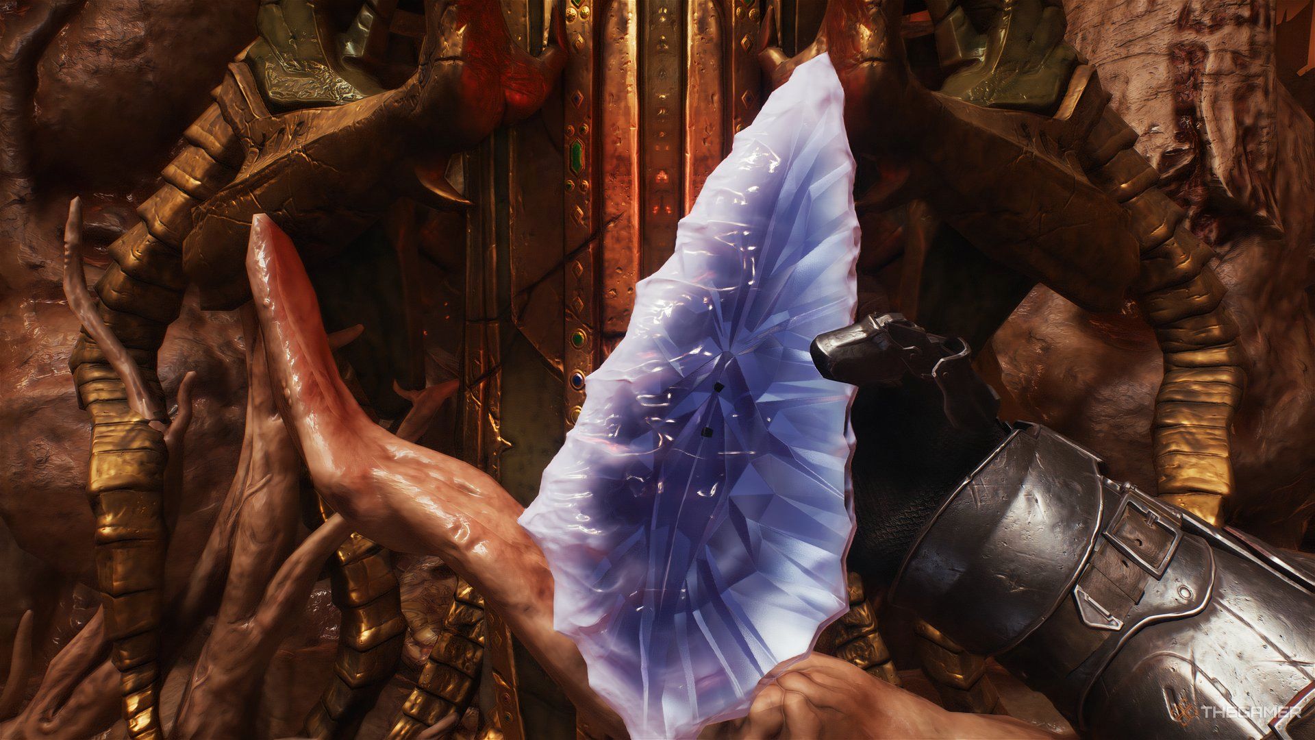 Doom Slayer holding the Wraithstone in DOOM: The Dark Ages. 