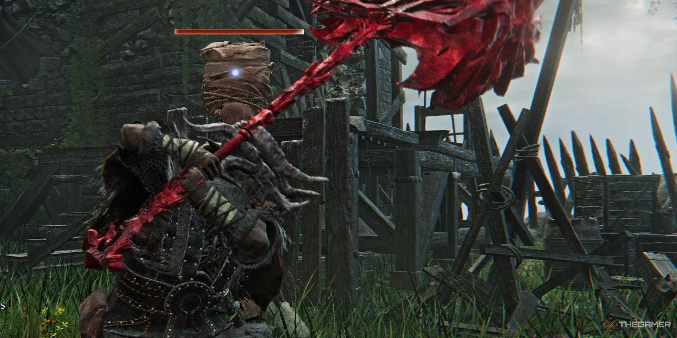 Elden Ring Nightreign Raider swinging a giant red hammer at a dummy.