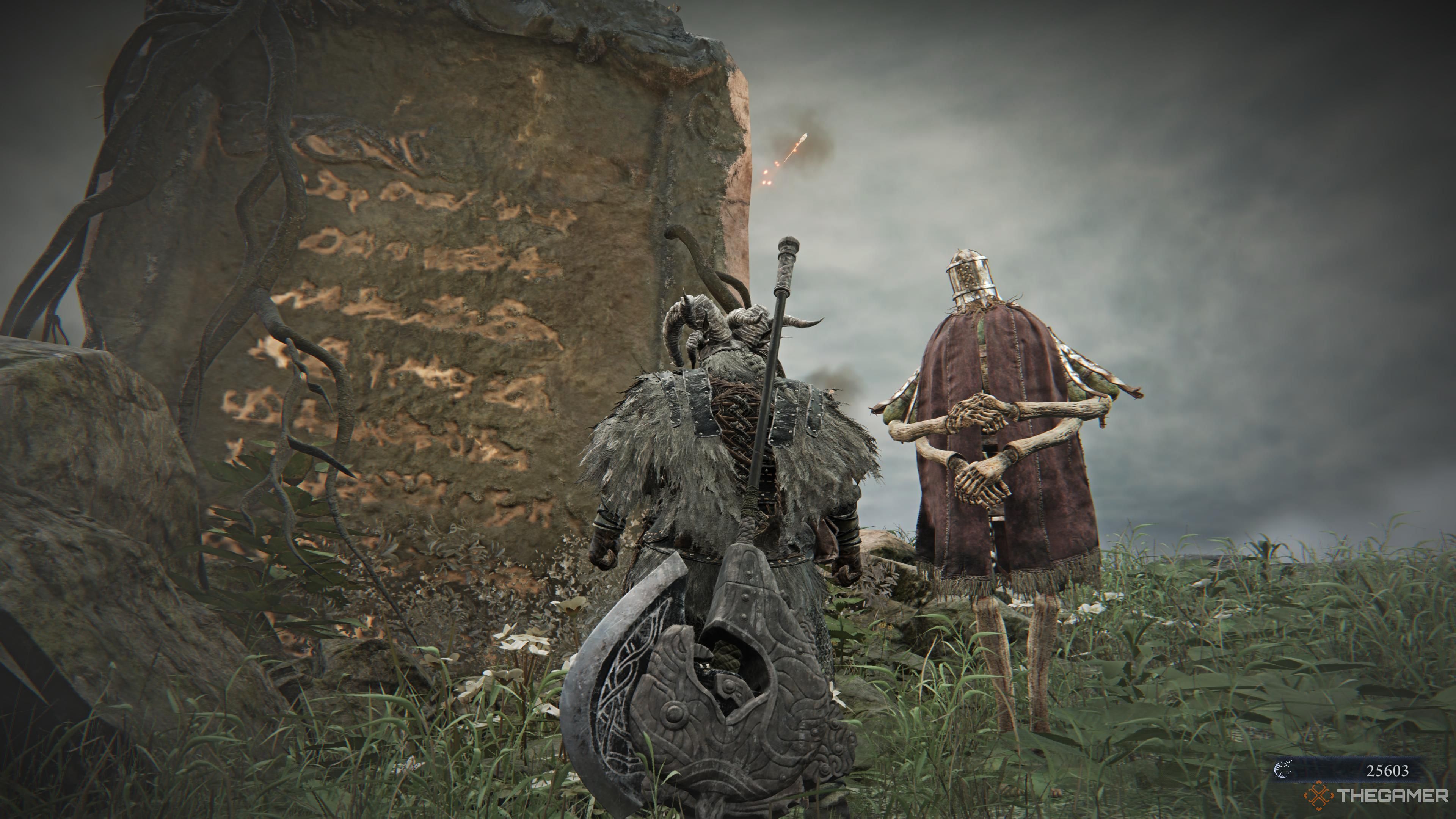 The raider standing beside a glowing monument in elden ring nightreign.