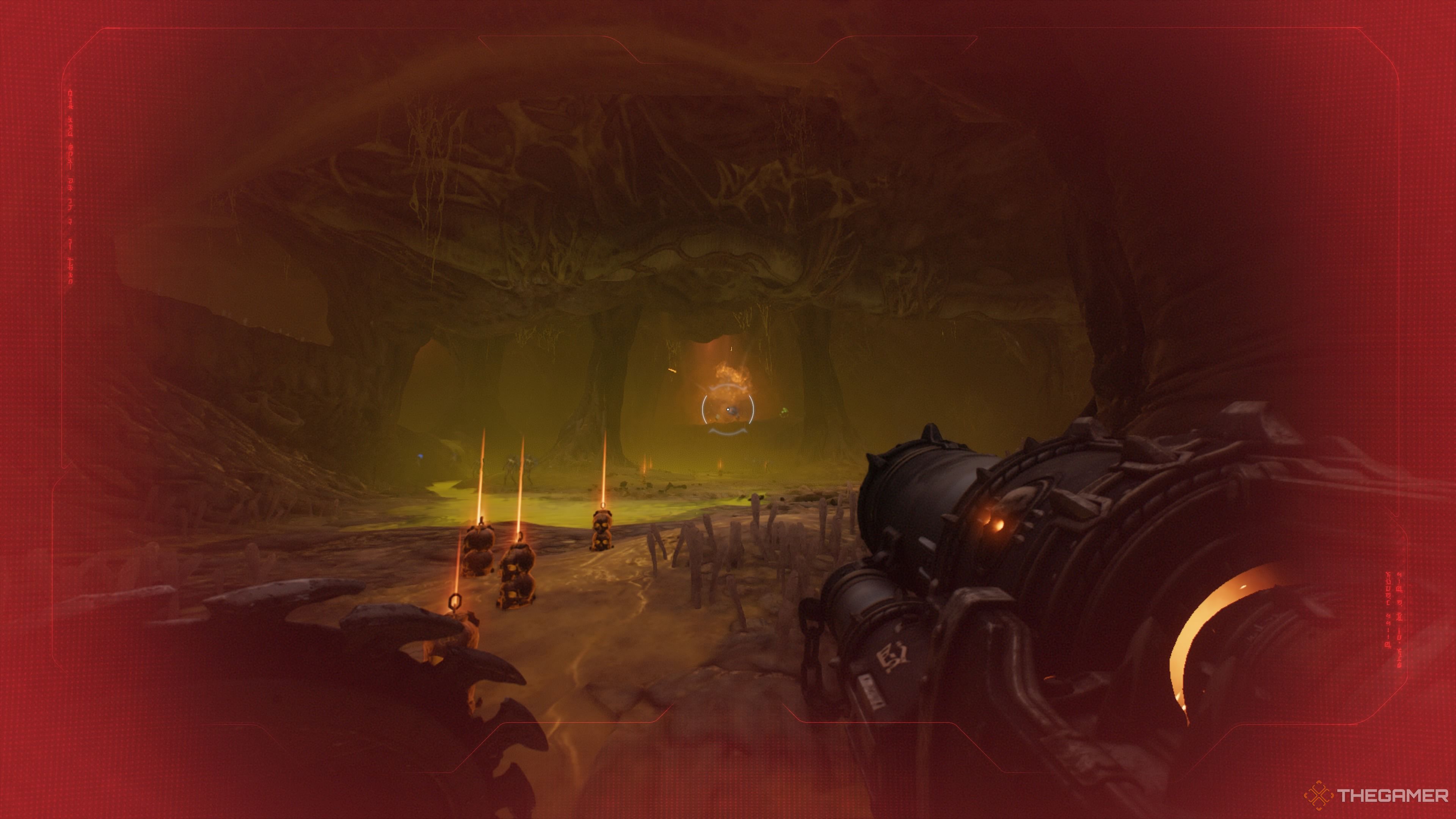 Firing missiles at the Mancubus from a distance in the Belly of the Beast chapter of Doom The Dark Ages.