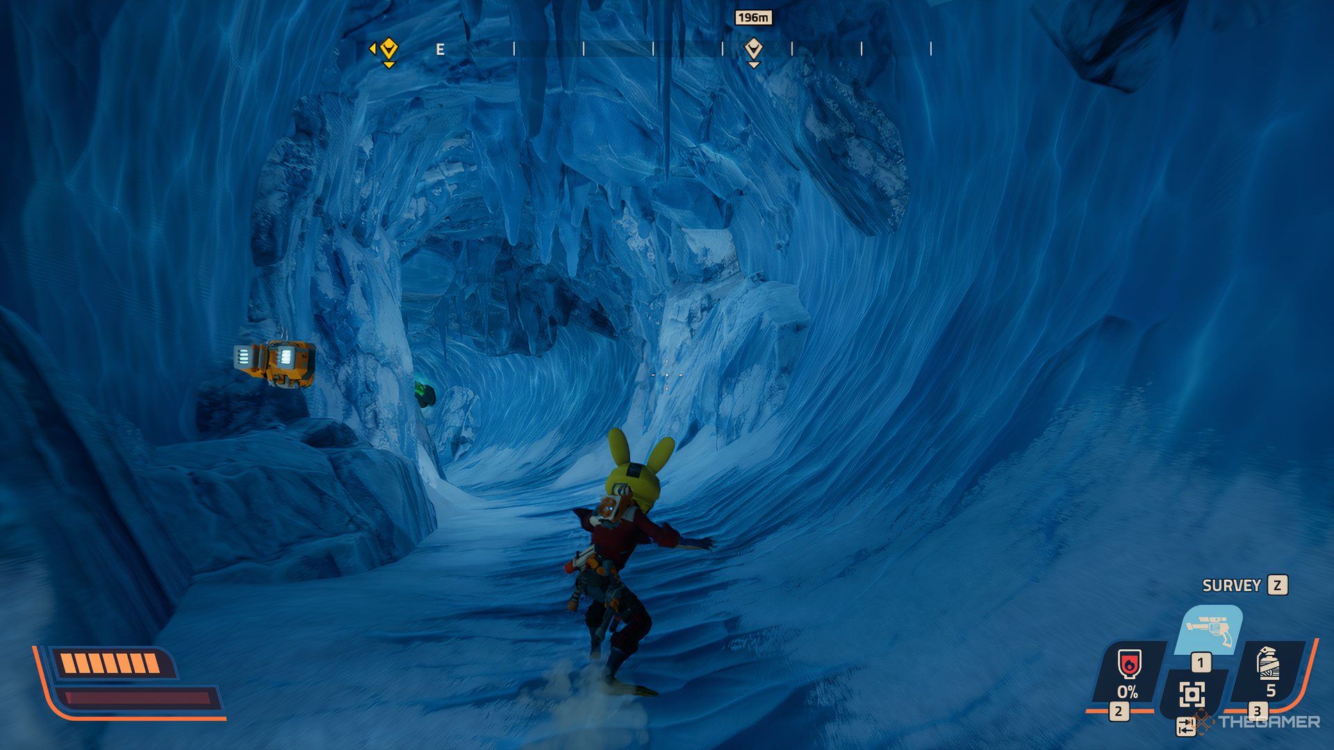 Player sliding down an ice tunnel in Revenge of the Savage Planet.