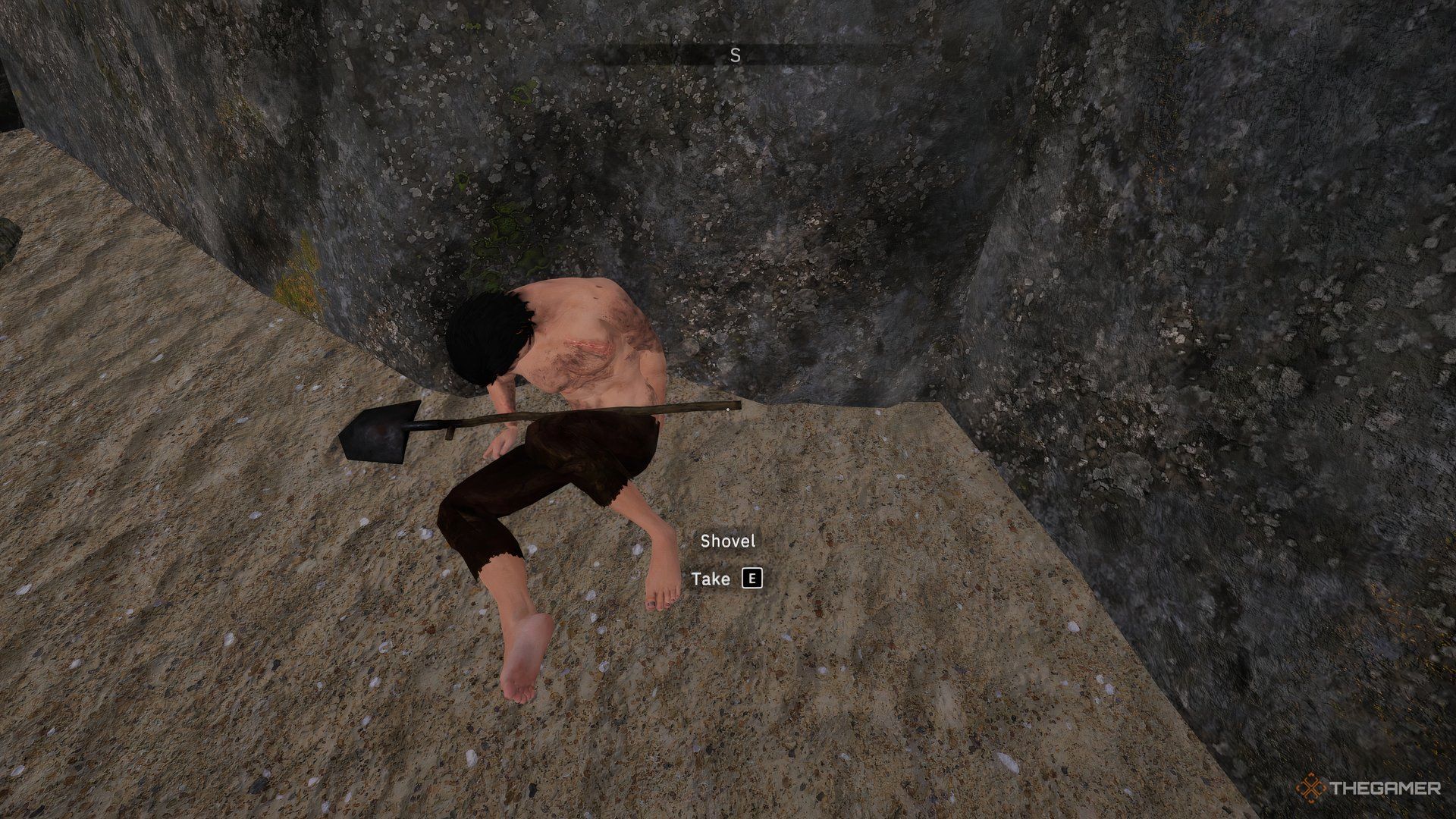 Tainted Grail Fall of Avalon A dead body with a shovel on the beach.