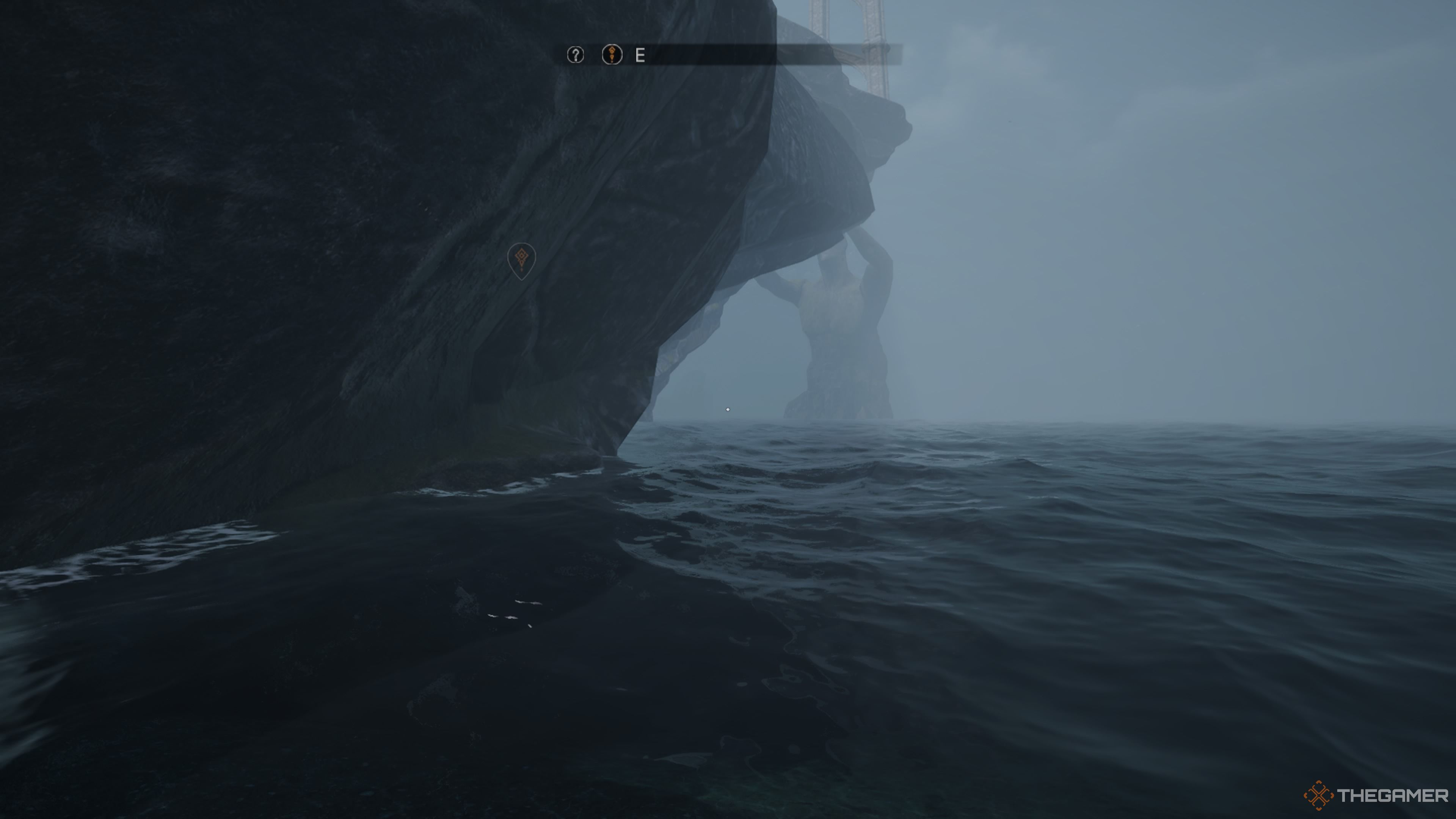 Player character walking along the shore line underneath a giant rock formation in Tainted Grail: The Fall Of Avalon.