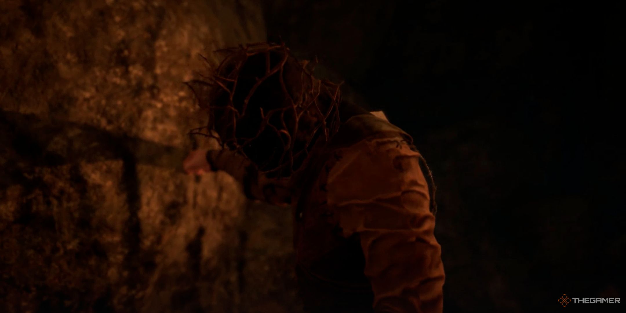 The Frantic Bererker punching a wall in the Asylum section of Tainted Grail The Fall of Avalon.