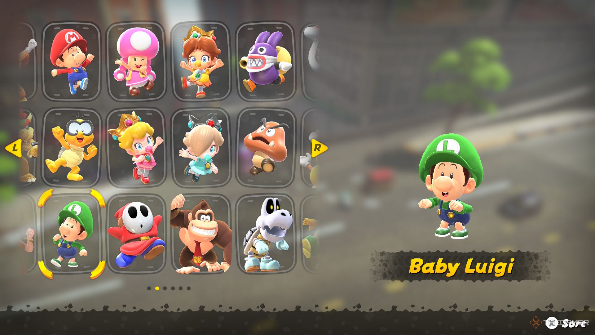 Baby Luigi in the Mario Kart World character selection screen.