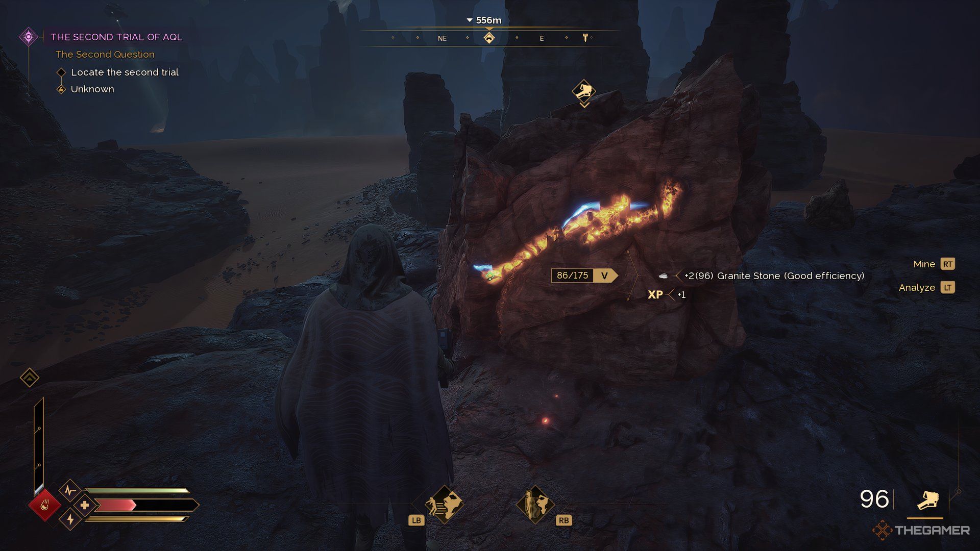 Player breaking down a stone in Dune: Awakening. There is a yellow and blue line on the stone. 
