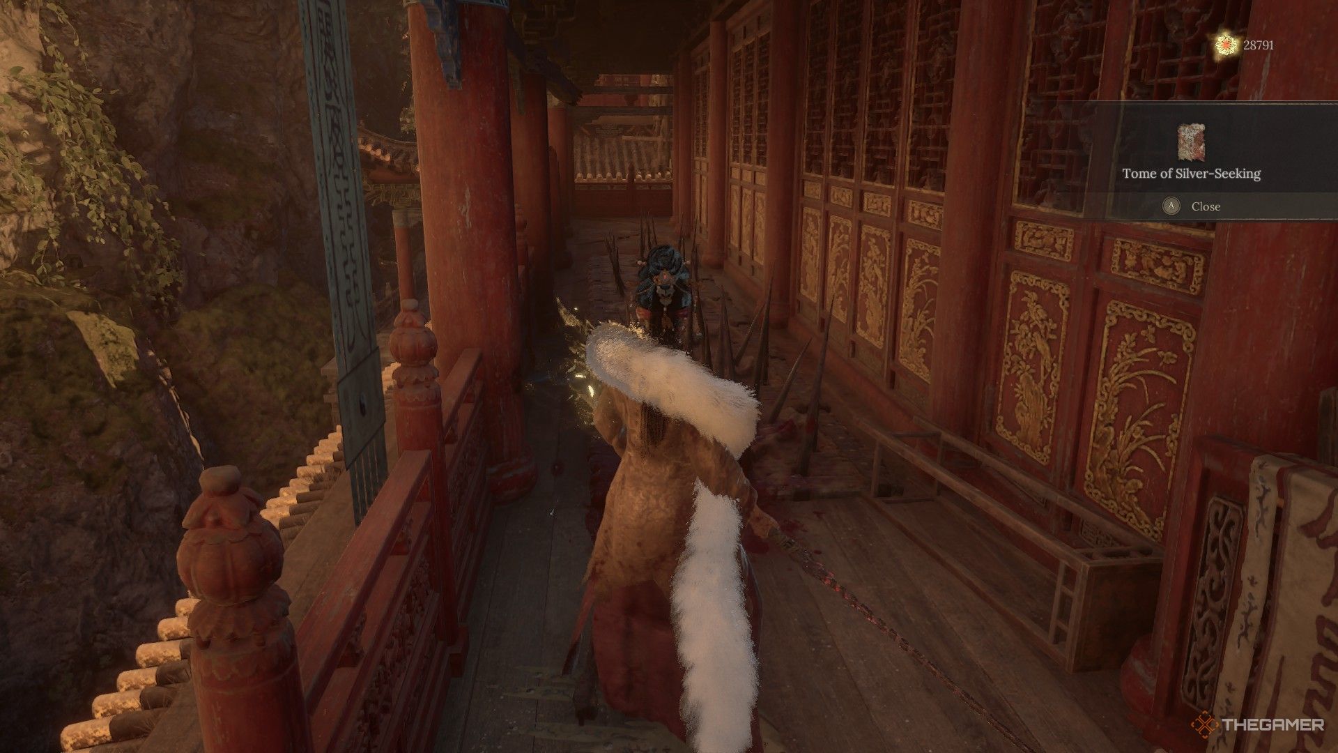 Wuchang finds the Tome of Silver-Seeking behind a set of spike traps in Wuchang: Fallen Feathers.